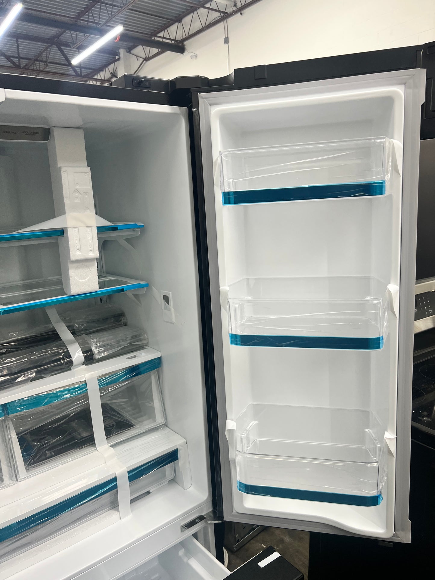 ZLINE KITCHEN & BATH Counter-Depth Autograph Edition 22.5-cu ft 4 -Door French Door Refrigerator with Ice Maker with Ice Dispenser ( Fingerprint Resistant Black Stainless Steel with Champagne Bronze accent Handles)-Model #RFM-36-BS-CB