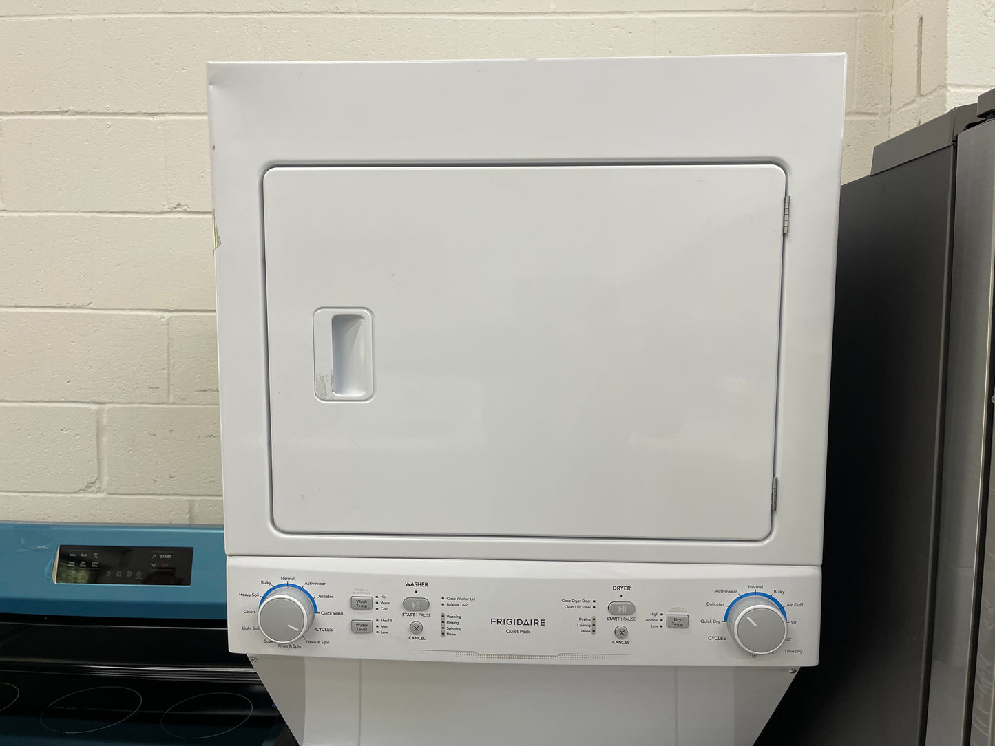 Frigidaire Quick Wash and Dry Cycle, Maxfill Wash Cycle Stacked Laundry Center with 3.9-cu ft Top Load Washer and Gas 5.6-cu ft Dryer