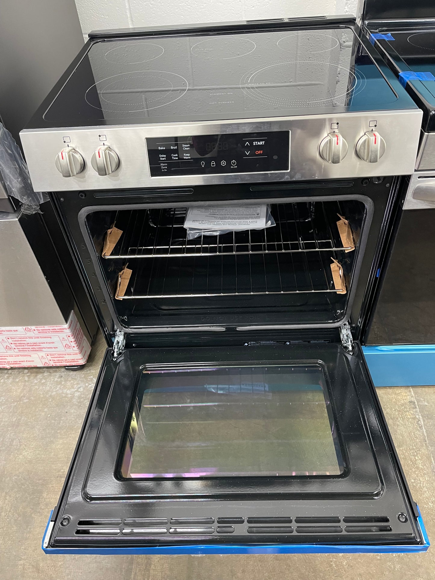 Frigidaire 30-in Glass Top 5 Burners 5.3 cu-ft Slide-In Electric Range in Stainless Steel-Model #FCFE3062AS