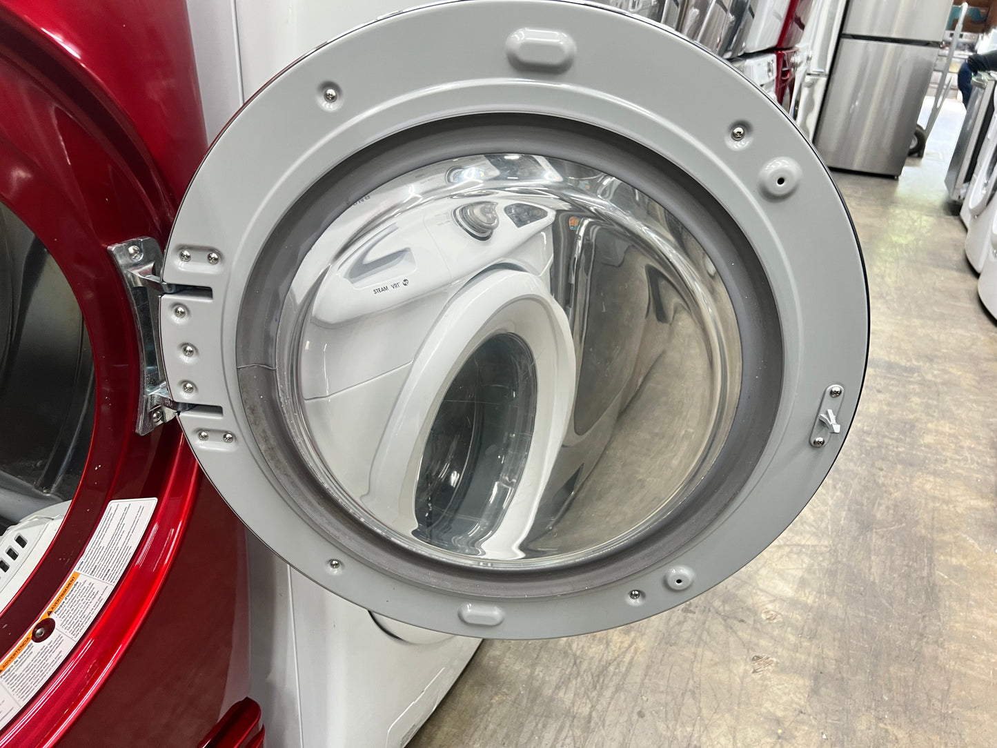 LG Front-Load 3.9 Cu. Ft. Washer and 7.4 Cu. Ft. Electric Dryer Set in Wild Cherry Red with Pedestals
