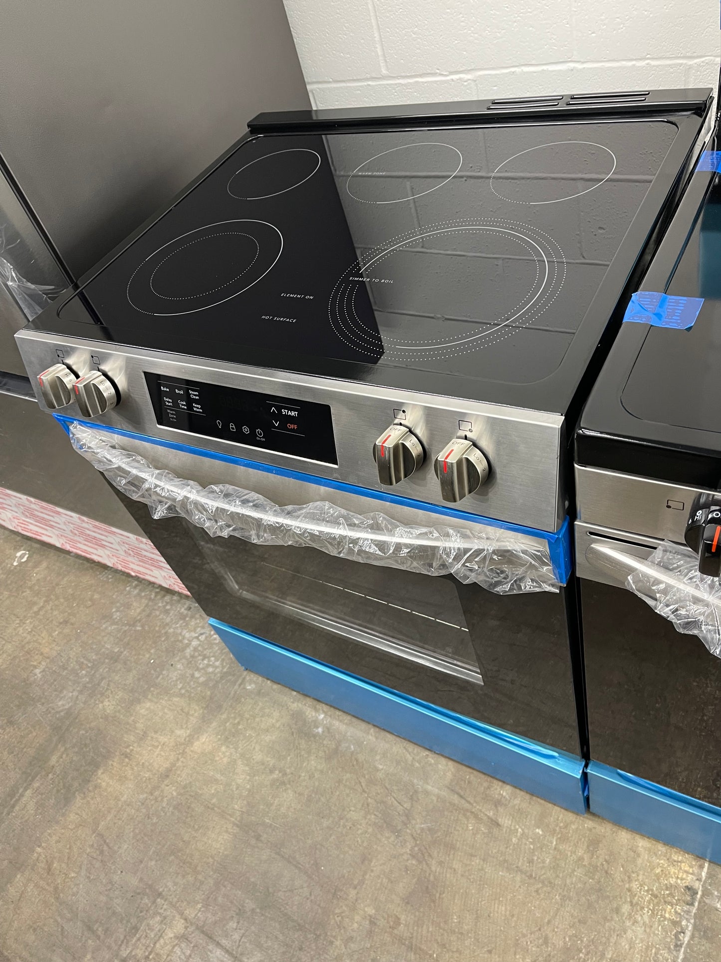 Frigidaire 30-in Glass Top 5 Burners 5.3 cu-ft Slide-In Electric Range in Stainless Steel-Model #FCFE3062AS