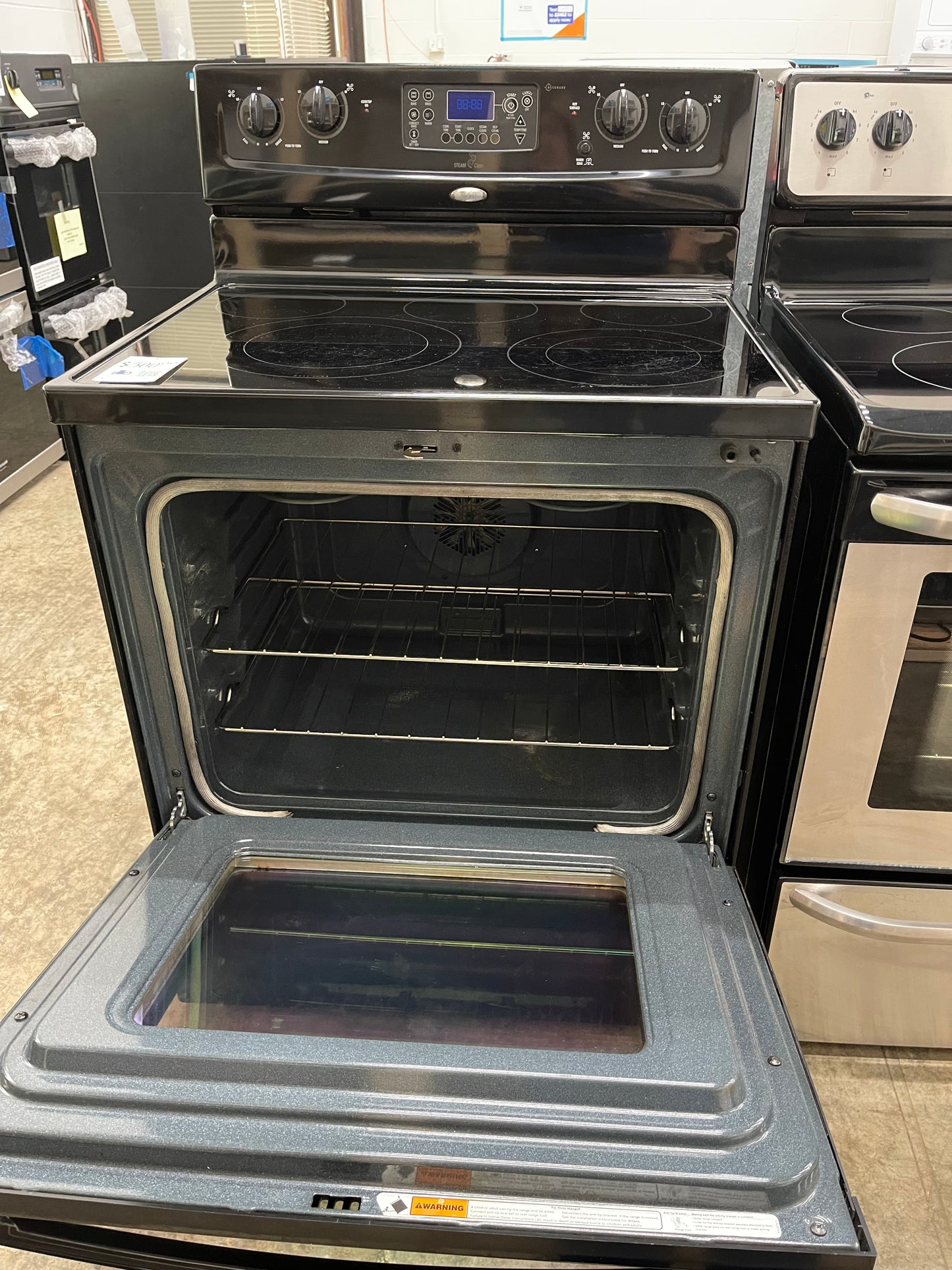 Whirlpool WFE381LVB
30 Inch Freestanding Electric Range with 4 Radiant Burners, Ceramic Glass Cooktop, 5.3 cu. ft. Capacity Oven, Rapid Boil Element, TimeSavor Convection Cooking and Storage Drawer: Black