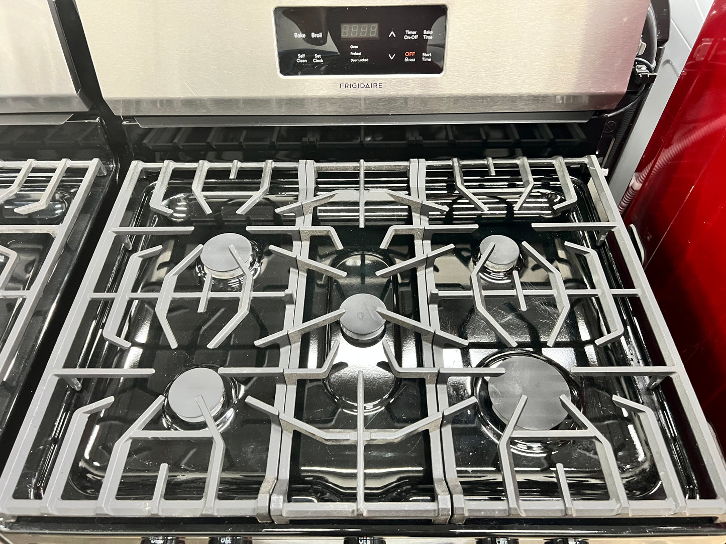 Frigidaire 30-in 5 Burners 5-cu ft Self Cleaning Gas Range in Stainless Steel-Model #FFGF3054TS