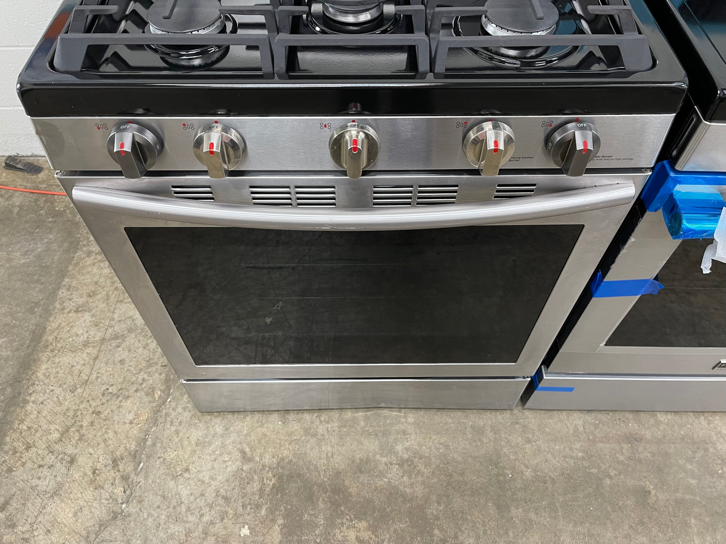 Samsung 30-in 5 Burners 5.8 cu. ft. Freestanding Gas Range with Convection Oven in Stainless Steel-Model #NX58H5600SS