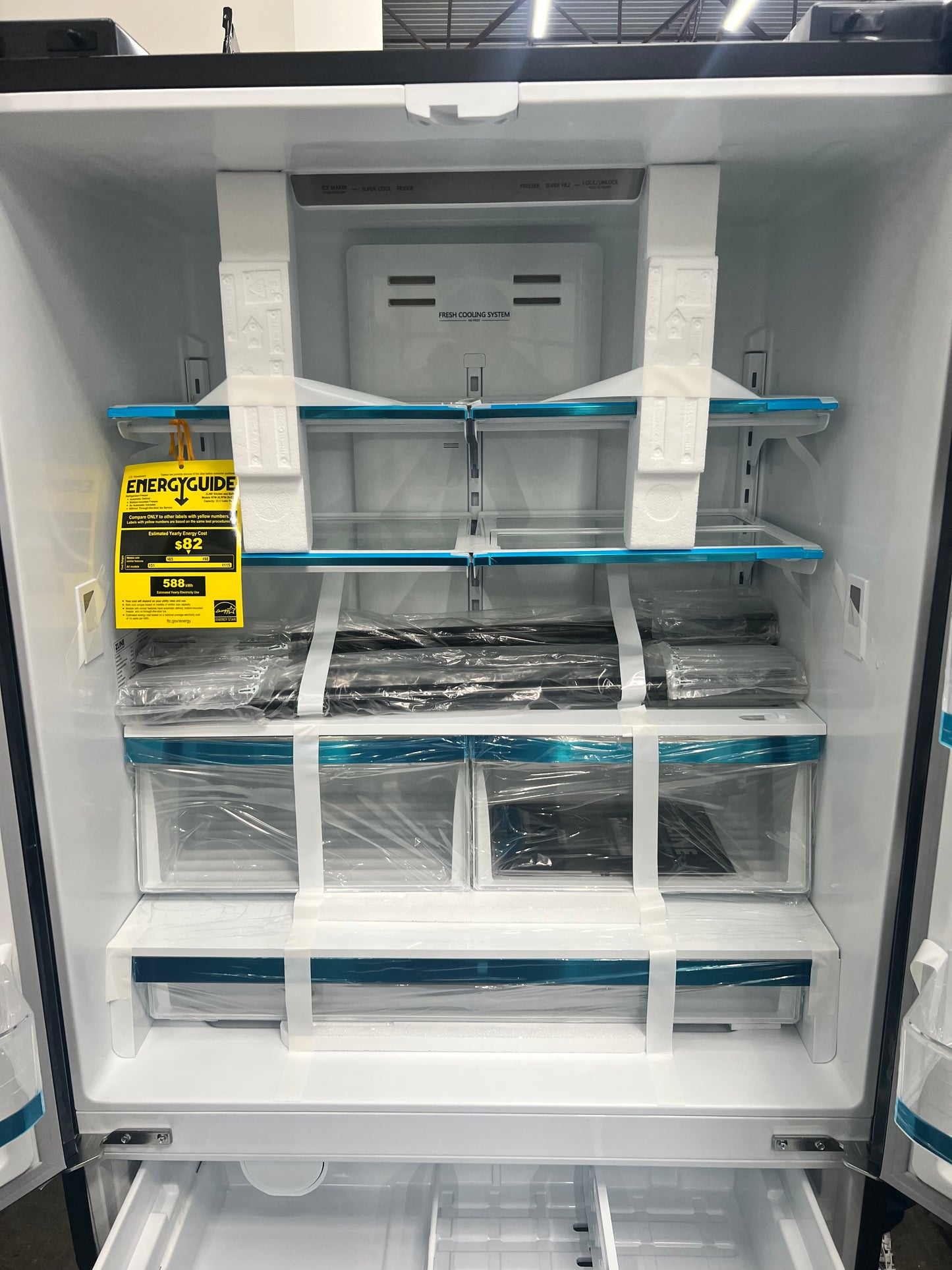 ZLINE KITCHEN & BATH Counter-Depth Autograph Edition 22.5-cu ft 4 -Door French Door Refrigerator with Ice Maker with Ice Dispenser ( Fingerprint Resistant Black Stainless Steel with Champagne Bronze accent Handles)-Model #RFM-36-BS-CB