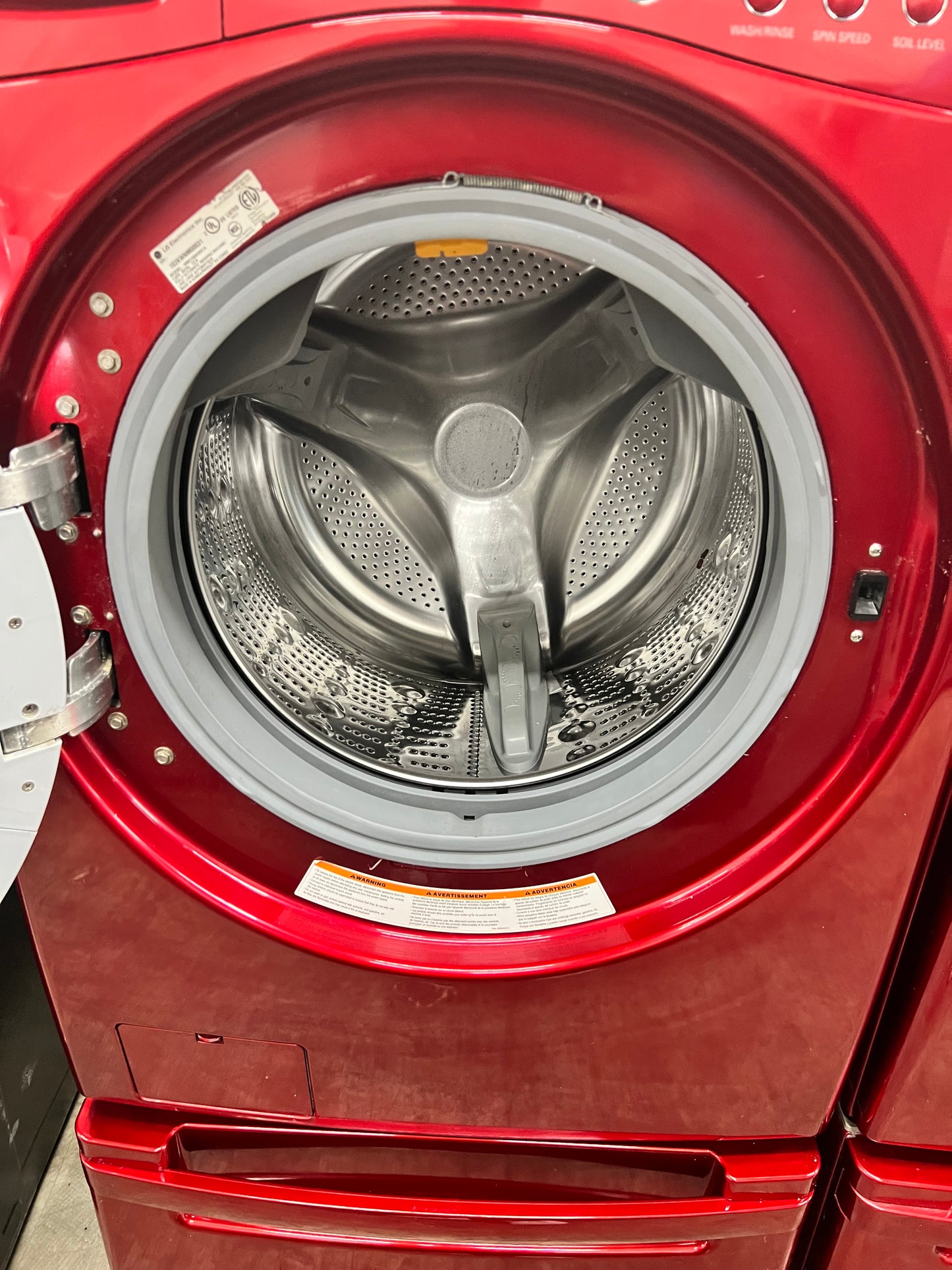 LG Front-Load 3.9 Cu. Ft. Washer and 7.4 Cu. Ft. Electric Dryer Set in Wild Cherry Red with Pedestals