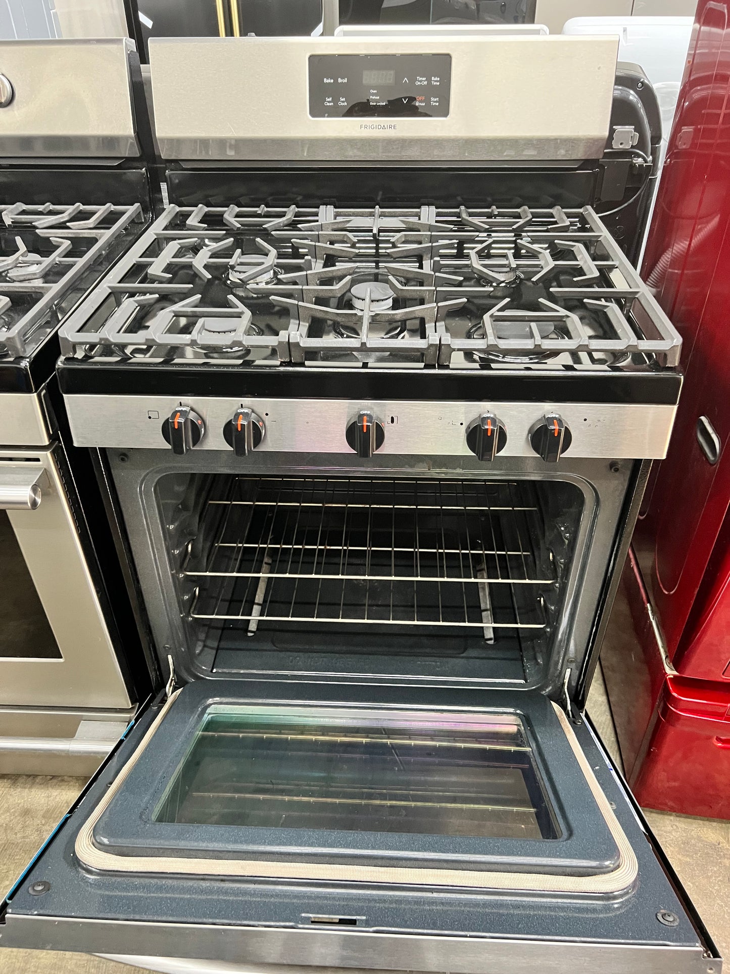 Frigidaire 30-in 5 Burners 5-cu ft Self Cleaning Gas Range in Stainless Steel-Model #FFGF3054TS