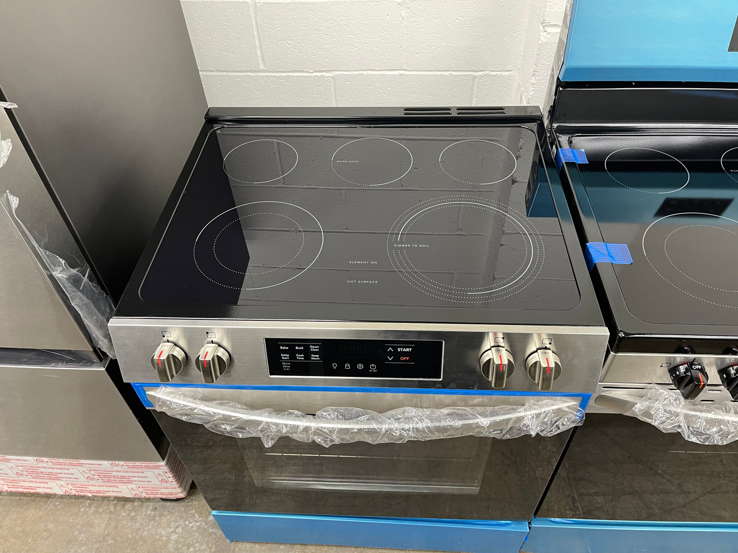 Frigidaire 30-in Glass Top 5 Burners 5.3 cu-ft Slide-In Electric Range in Stainless Steel-Model #FCFE3062AS