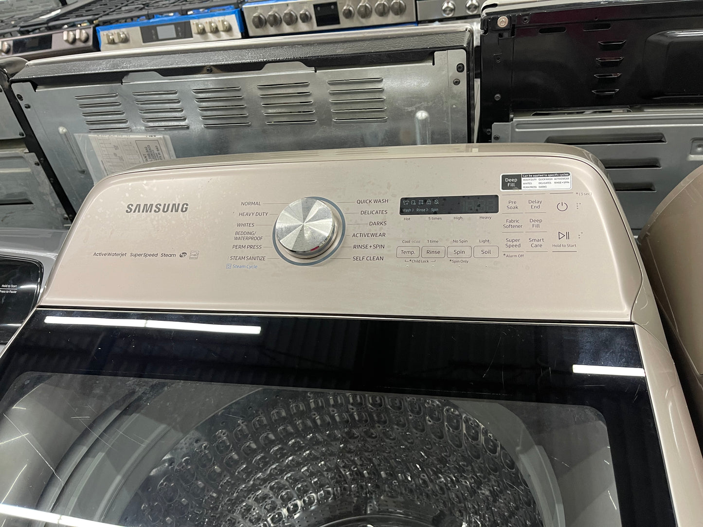 5.4 cu. ft. Top Load Washer with Super Speed in Champagne Model: WA54R7600AC/US and Samsung - 7.4 Cu. Ft. Smart Electric Dryer with Steam and Super Speed Dry - Champagne Model: DVE54R7600C/A3
