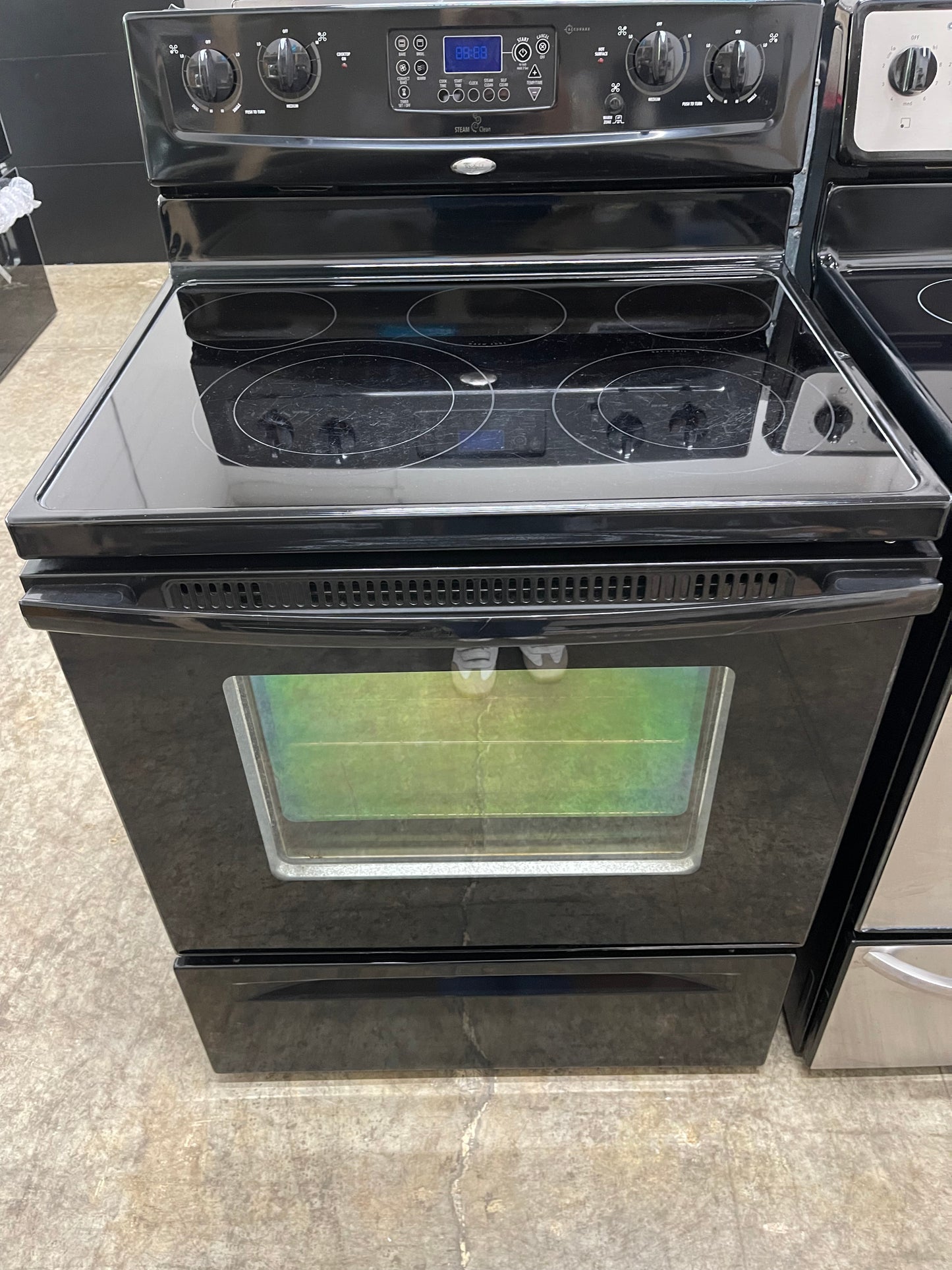 Whirlpool WFE381LVB
30 Inch Freestanding Electric Range with 4 Radiant Burners, Ceramic Glass Cooktop, 5.3 cu. ft. Capacity Oven, Rapid Boil Element, TimeSavor Convection Cooking and Storage Drawer: Black