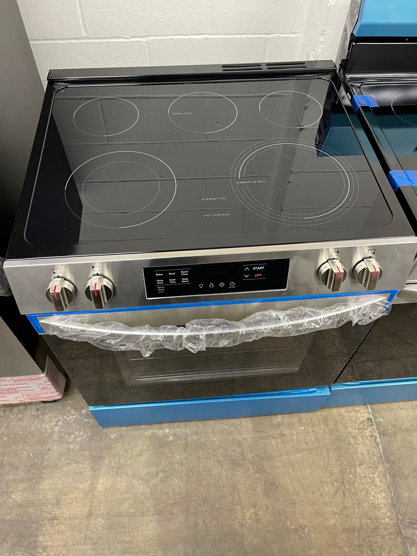 Frigidaire 30-in Glass Top 5 Burners 5.3 cu-ft Slide-In Electric Range in Stainless Steel-Model #FCFE3062AS