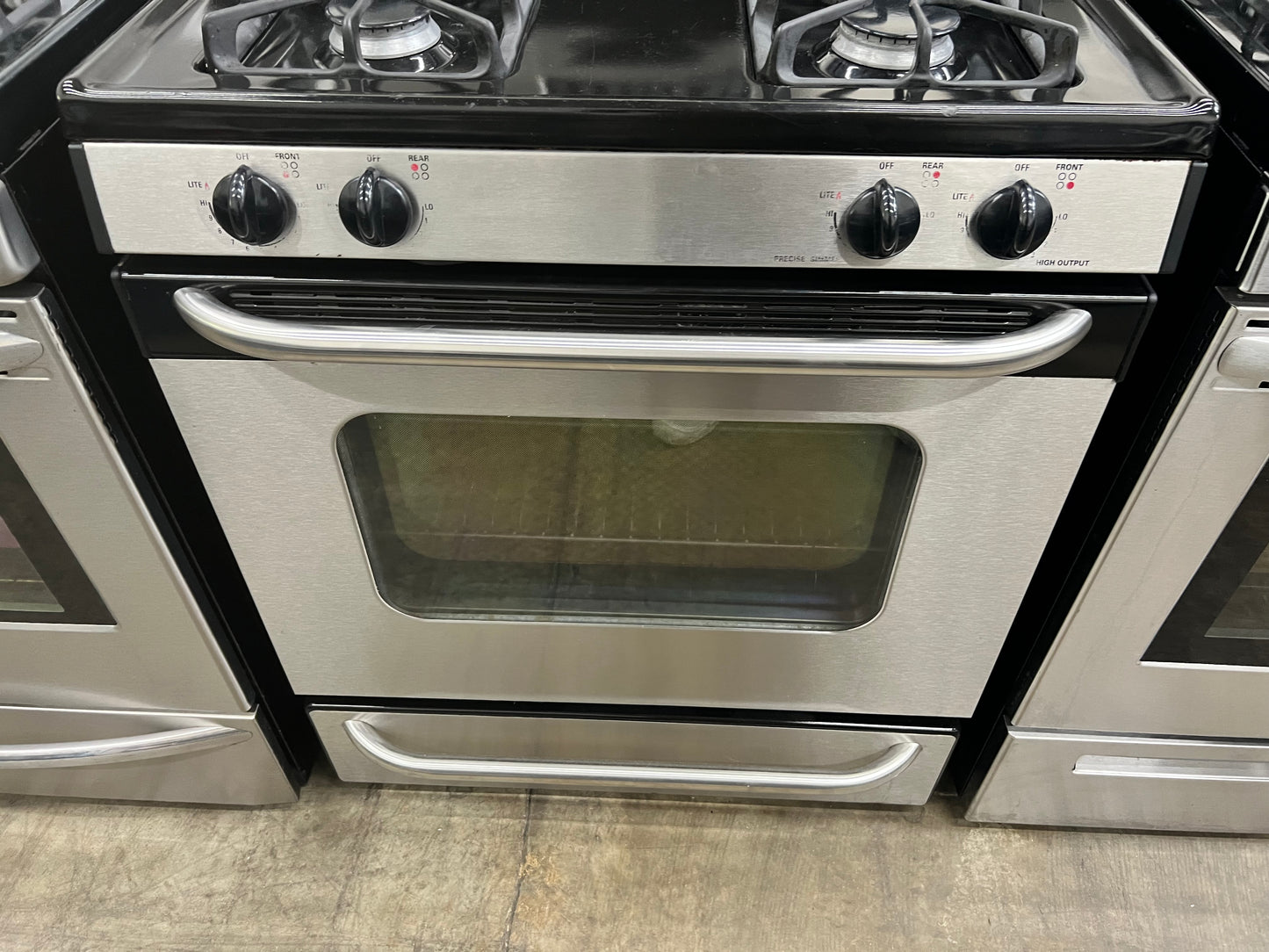 GE 30" Free-Standing Gas Range with 5.0 Cubic Feet Capacity Oven in Stainless Steel-Model #JGBP33SEHSS