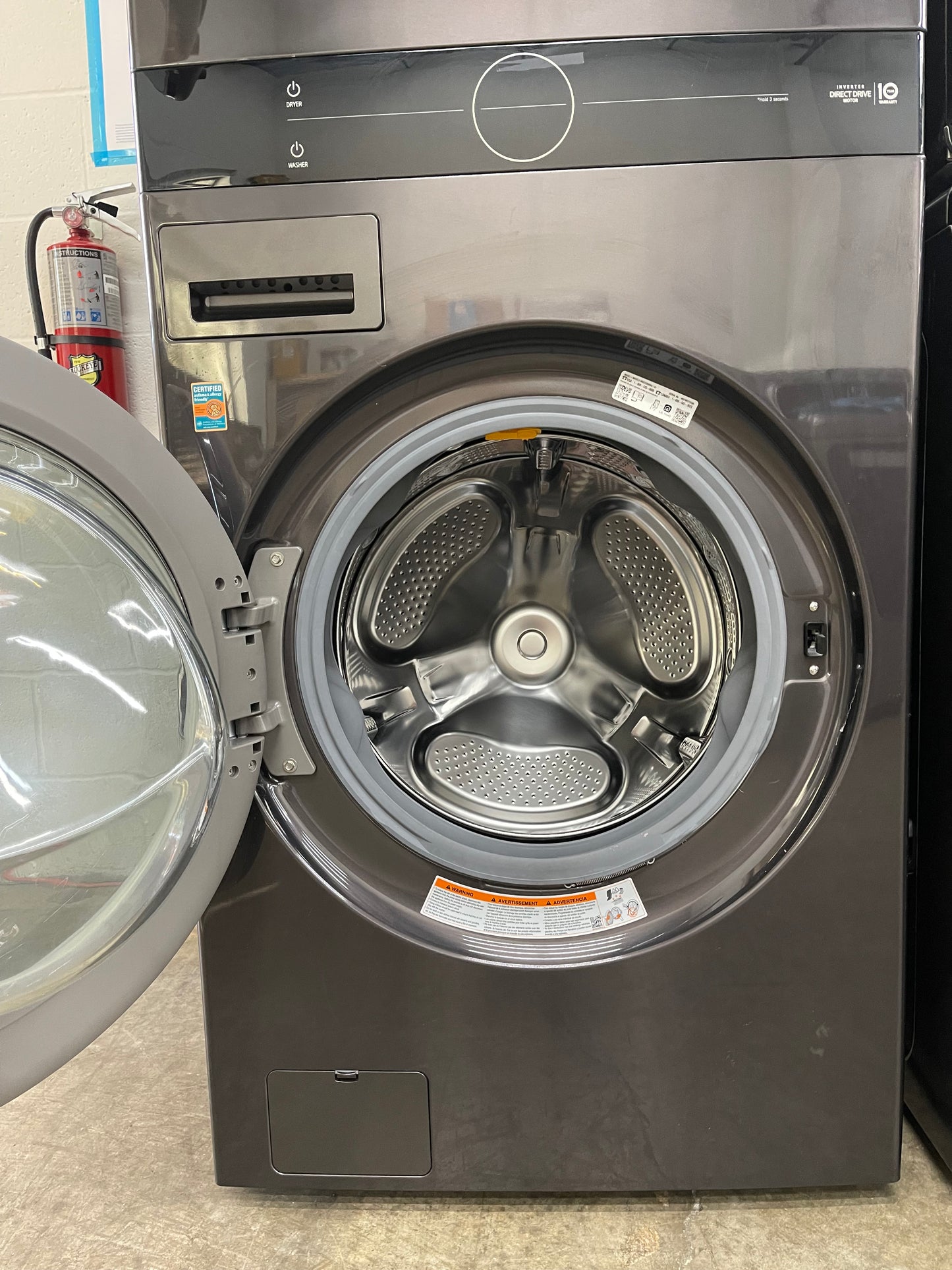 LG WashTower Stacked SMART Laundry Center 4.5 Cu.Ft. Front Load Washer & 7.4 Cu.Ft. Electric Dryer in Black Steel w/ Steam - Used