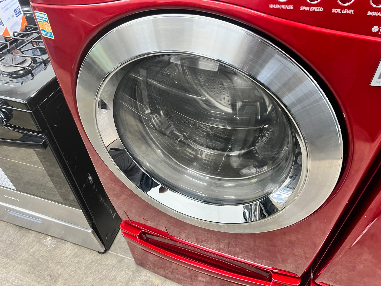 LG Front-Load 3.9 Cu. Ft. Washer and 7.4 Cu. Ft. Electric Dryer Set in Wild Cherry Red with Pedestals