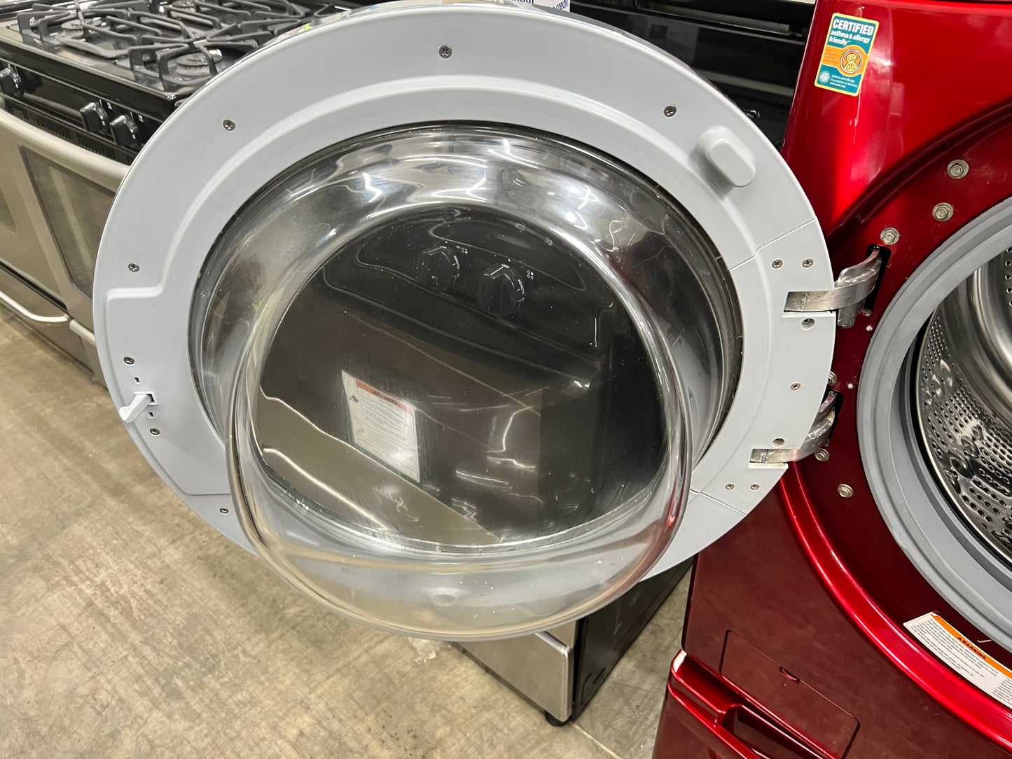 LG Front-Load 3.9 Cu. Ft. Washer and 7.4 Cu. Ft. Electric Dryer Set in Wild Cherry Red with Pedestals