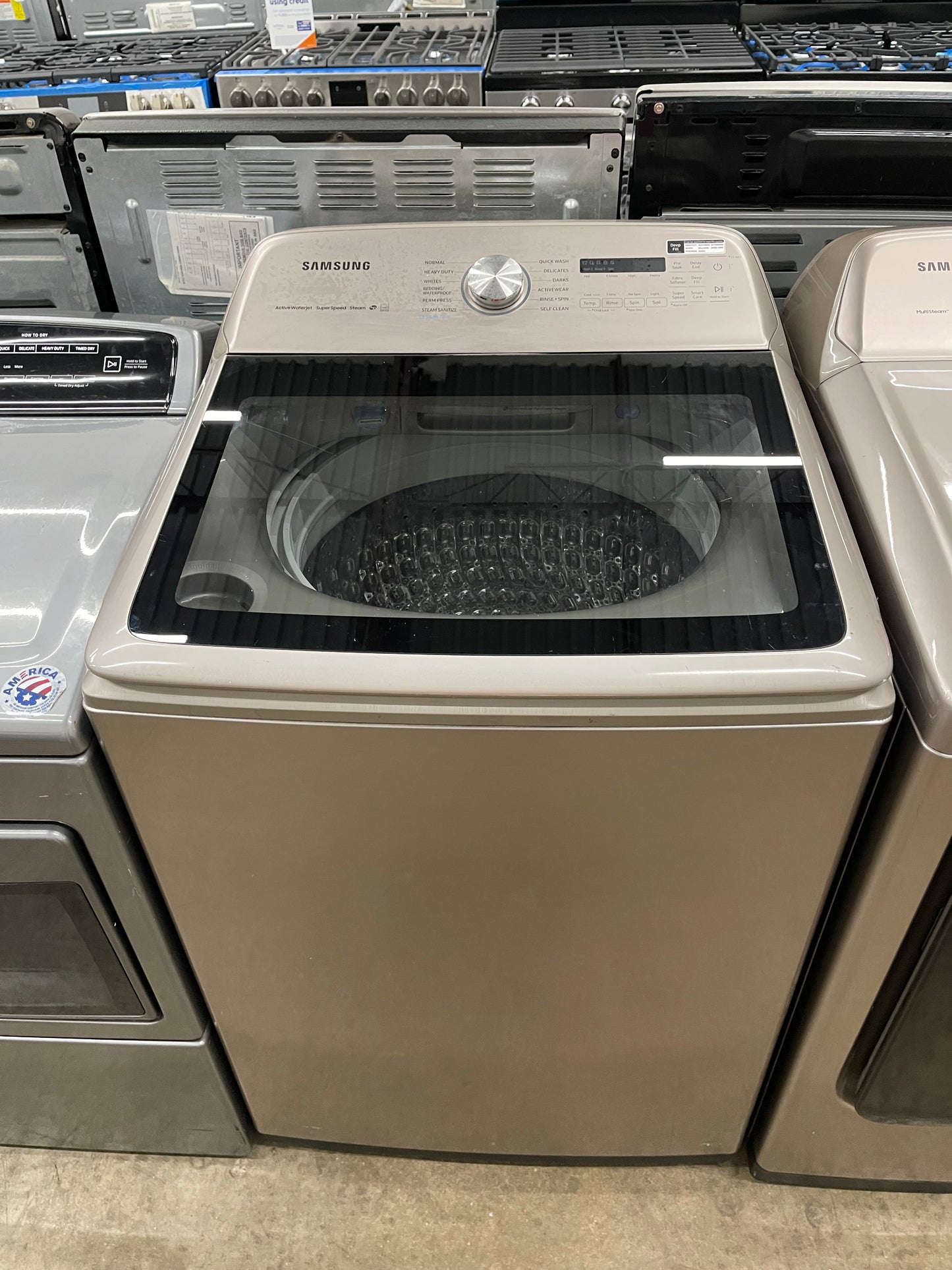 5.4 cu. ft. Top Load Washer with Super Speed in Champagne Model: WA54R7600AC/US and Samsung - 7.4 Cu. Ft. Smart Electric Dryer with Steam and Super Speed Dry - Champagne Model: DVE54R7600C/A3