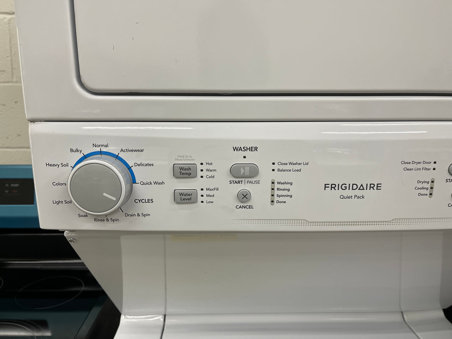 Frigidaire Quick Wash and Dry Cycle, Maxfill Wash Cycle Stacked Laundry Center with 3.9-cu ft Top Load Washer and Gas 5.6-cu ft Dryer