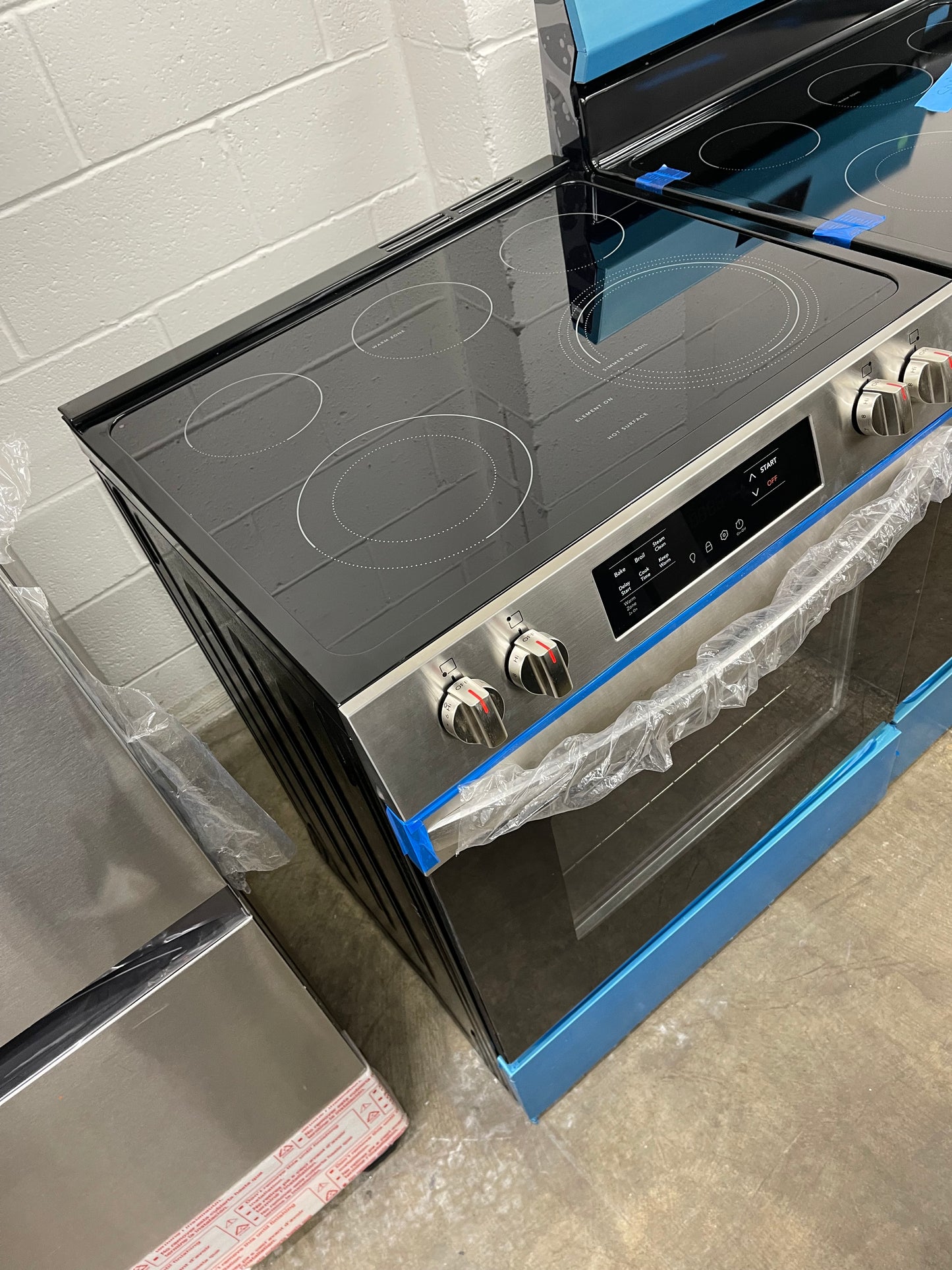 Frigidaire 30-in Glass Top 5 Burners 5.3 cu-ft Slide-In Electric Range in Stainless Steel-Model #FCFE3062AS