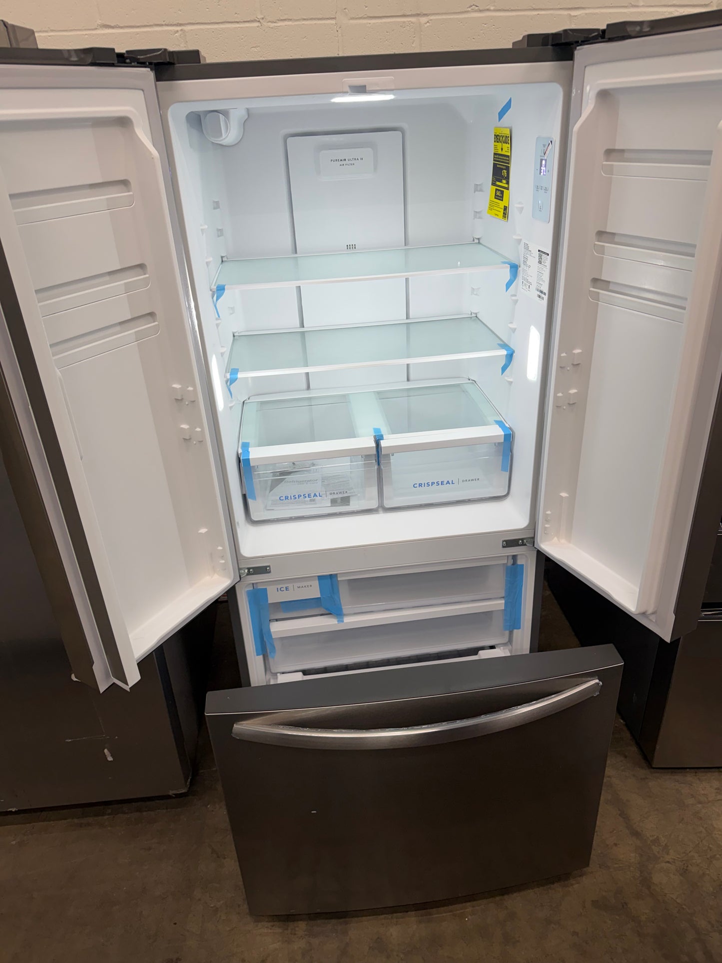 FRIGIDAIRE 31.5 in. 17.6 cu. ft. Counter Depth French Door Refrigerator, brushed steel Model # FRFG1723AV
