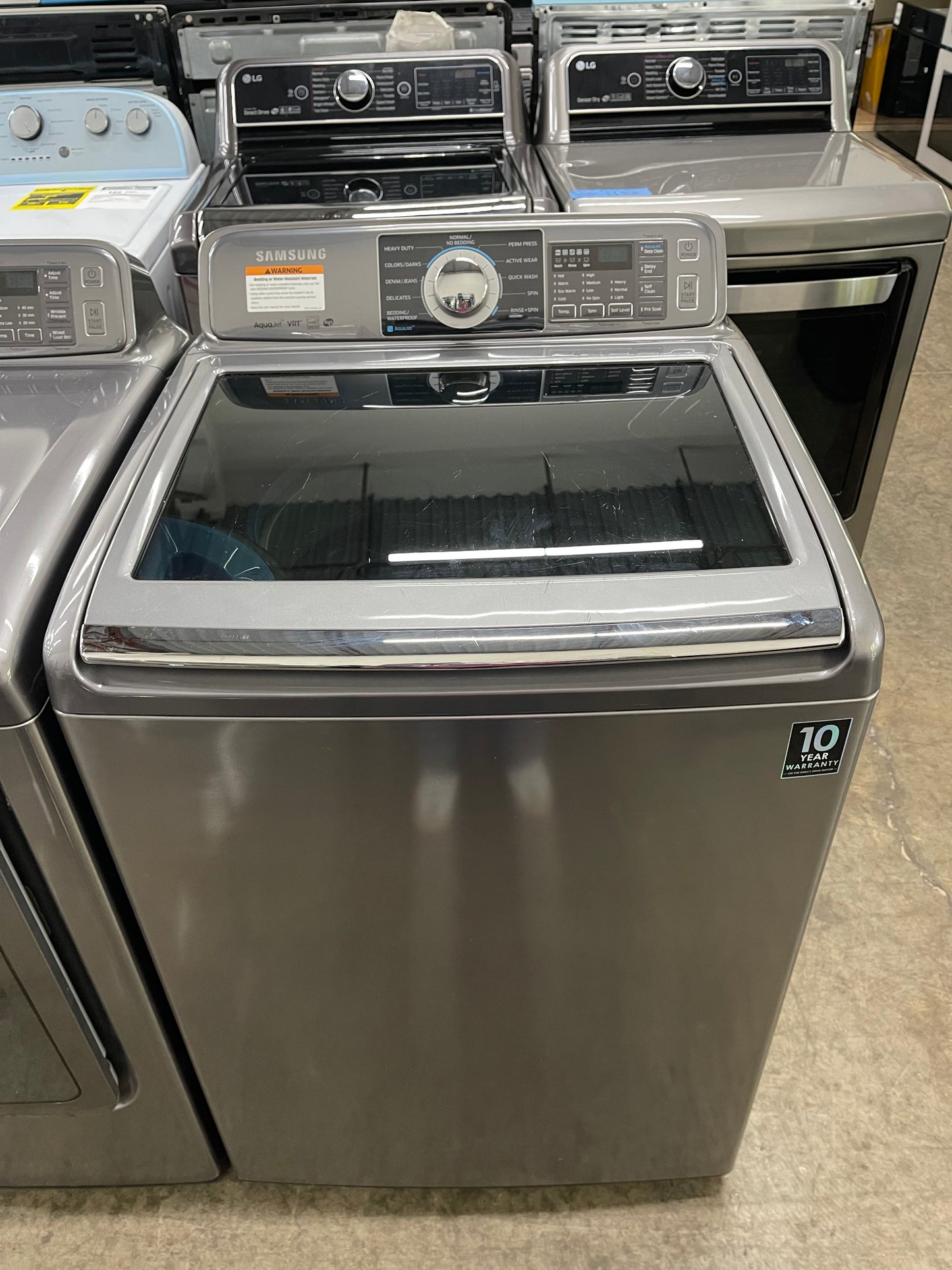 Samsung  WA48H7400AP
27 Inch 4.8 cu. ft. Top Load Washer with 11 Wash Cycles and Samsung  DV48H7400EP
27 Inch 7.4 cu. ft. Electric Dryer with 11 Dry Cycles,
