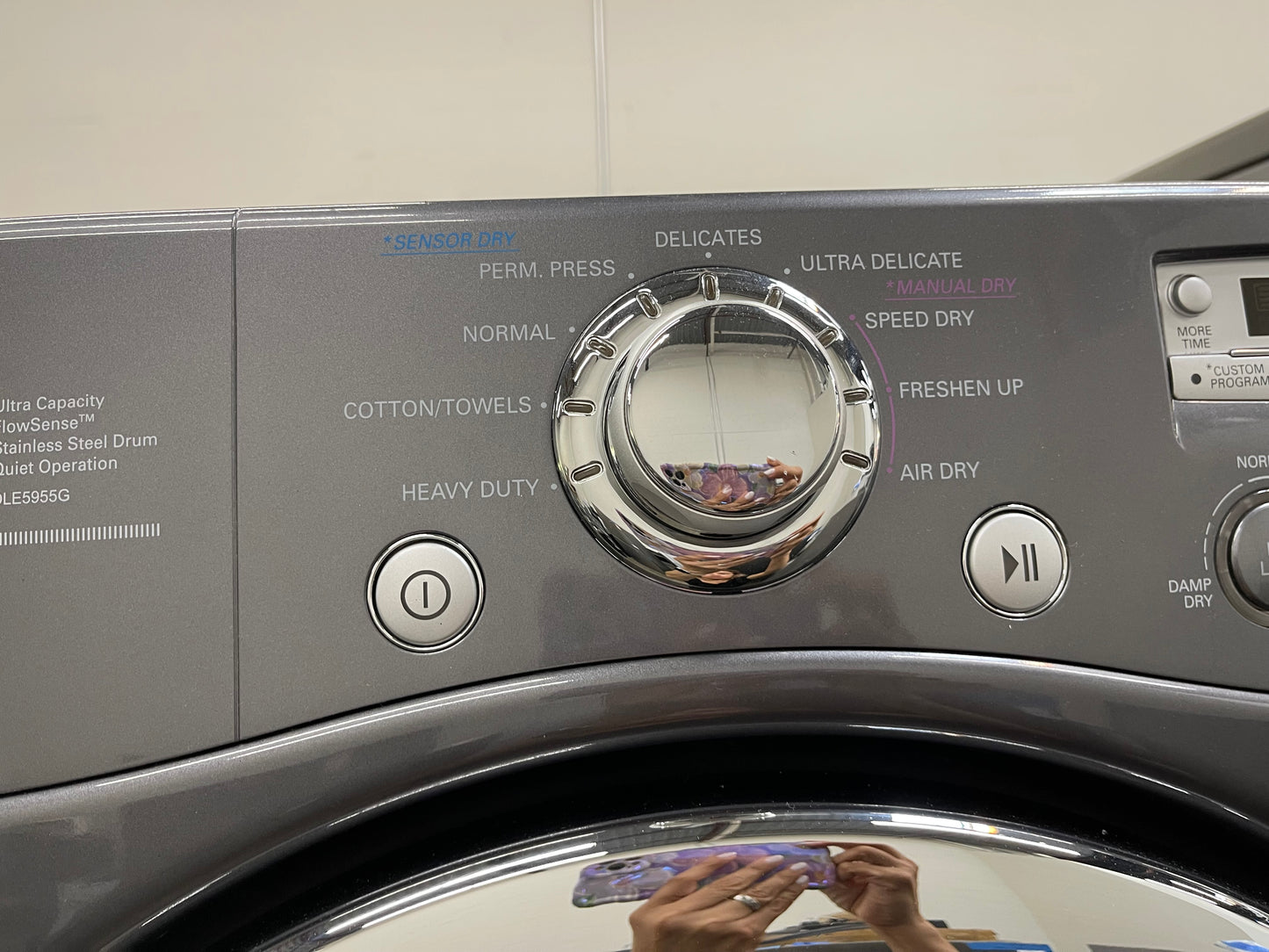LG  WM2455HG
27 Inch Front-Load Washer with 4.2 cu. ft. Capacity and LG  DLE5955G
27 Inch Electric Dryer with 7.3 cu. ft. Capacity