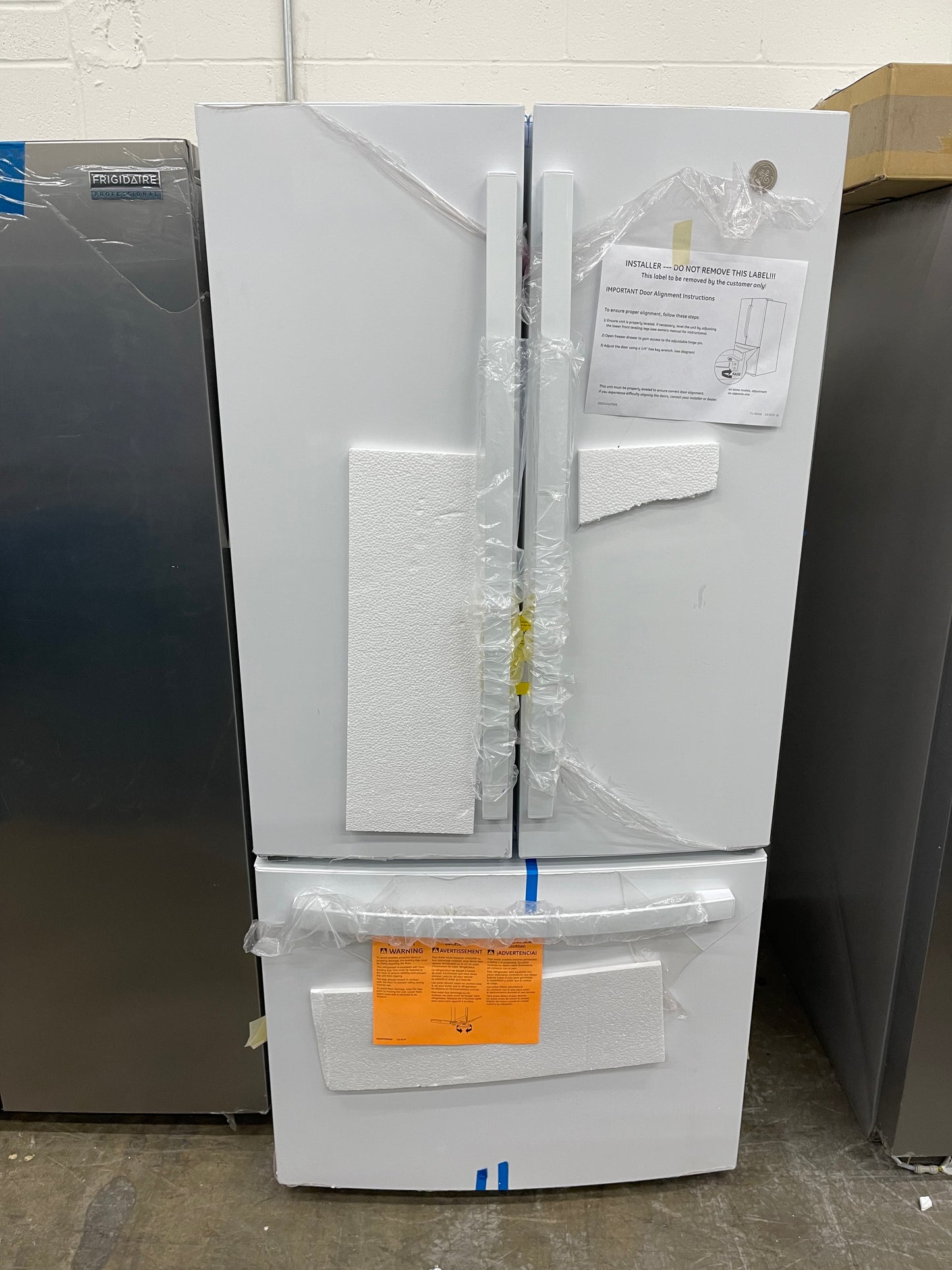 GE  GNE25JGKWW
33 Inch French Door Refrigerator with 24.7 Cu. Ft. Capacity, Quick Space Shelf, Turbo Cool, LED Lighting, Icemaker, Enhanced Shabbos Mode Capable, Internal Water Dispenser, Water Filtration, and ENERGY STAR Qualified: White