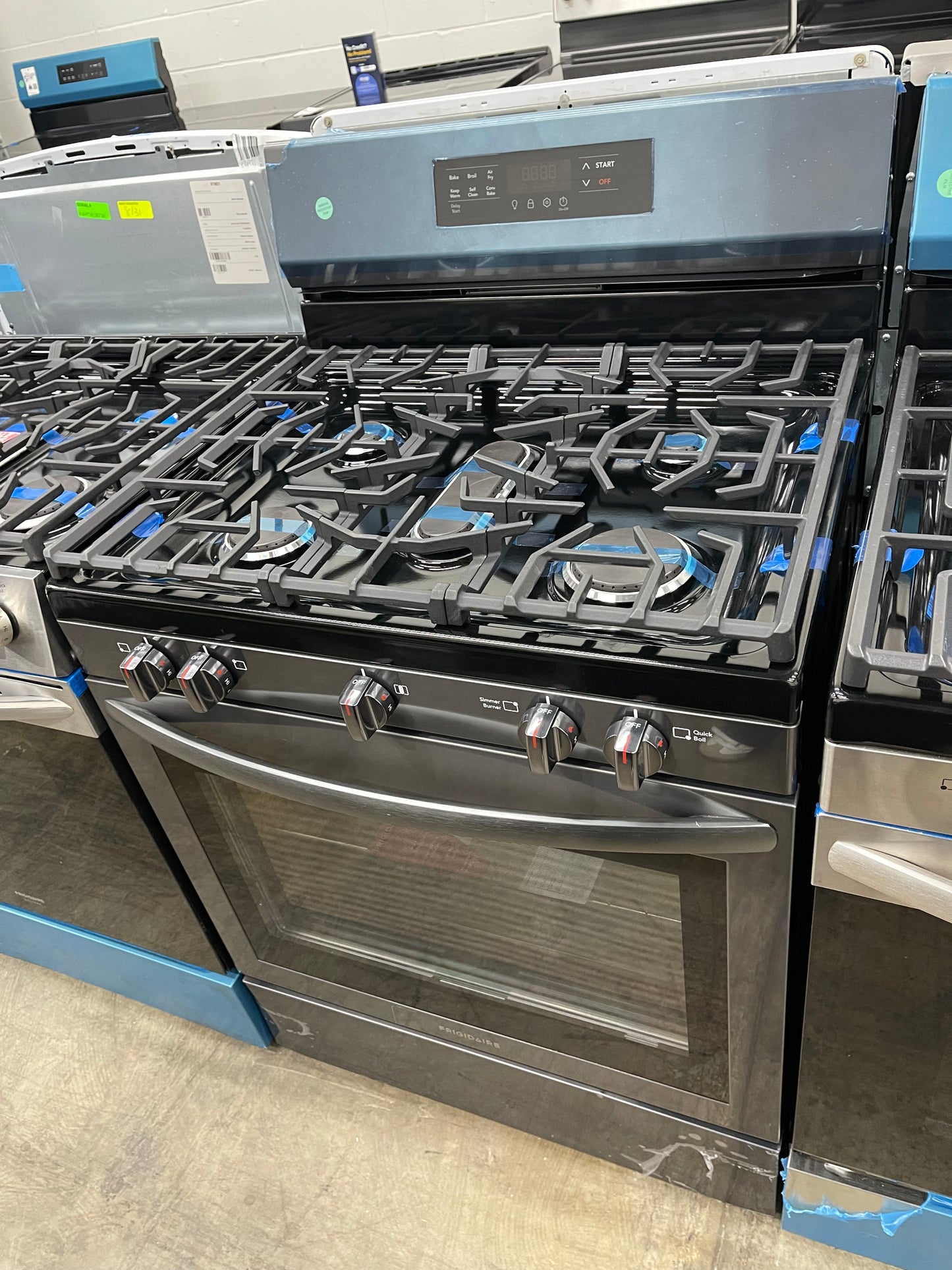 Frigidaire  FCRG3083AD
30 Inch Freestanding Gas Range with 5 Sealed Burners, 5.1 cu. ft. Convection Oven, Quick Boil Burner, Simmer Burner, Storage Drawer, Air Fry, and Self Clean: Black Stainless Steel