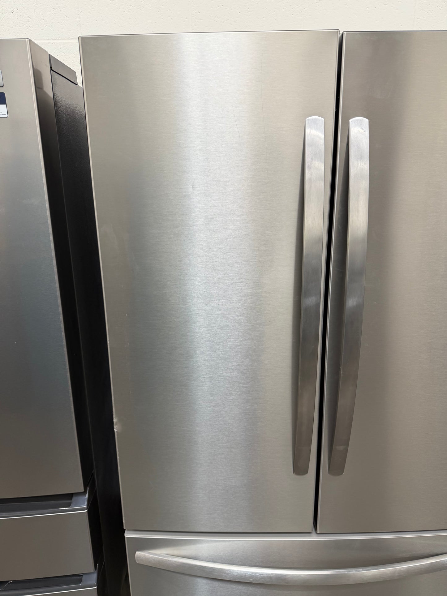 Frigidaire  FRFN2813AF
36 Inch Freestanding French Door Refrigerator with 28.8 cu. ft. Capacity, 3 Glass Shelves, Full-Width Drawer, Gallon Door Bins, EvenTemp Cooling, Internal Water Dispenser, and ENERGY STAR