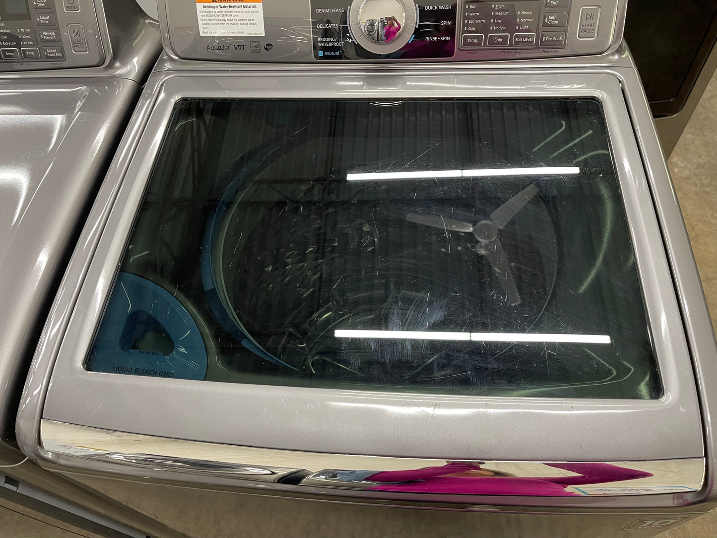 Samsung  WA48H7400AP
27 Inch 4.8 cu. ft. Top Load Washer with 11 Wash Cycles and Samsung  DV48H7400EP
27 Inch 7.4 cu. ft. Electric Dryer with 11 Dry Cycles,