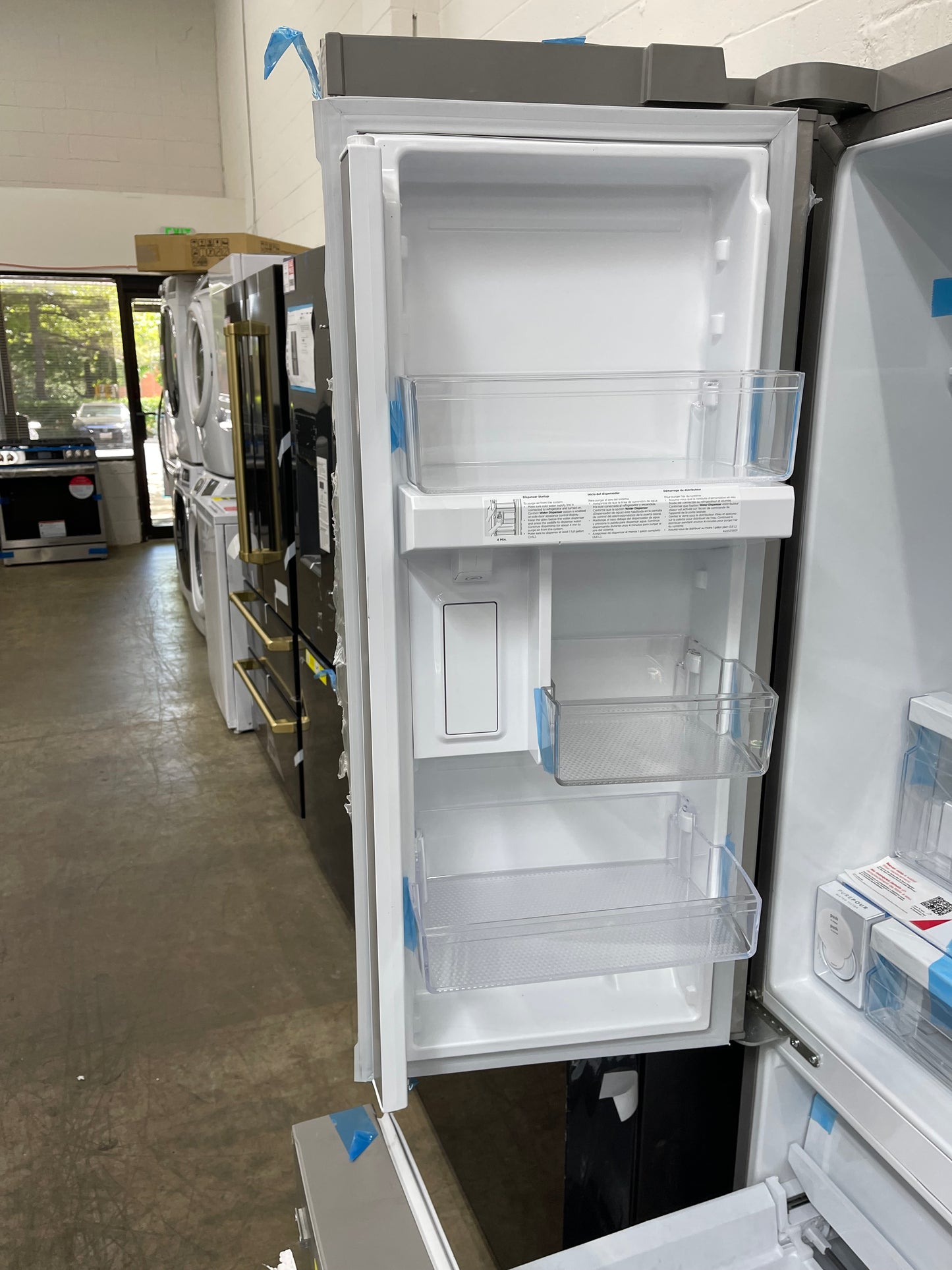 Frigidaire 28.8-cu ft 3-Door French Door Refrigerator With Ice Maker with Water Dispenser in Stainless Steel-Model #FRFN2813AF