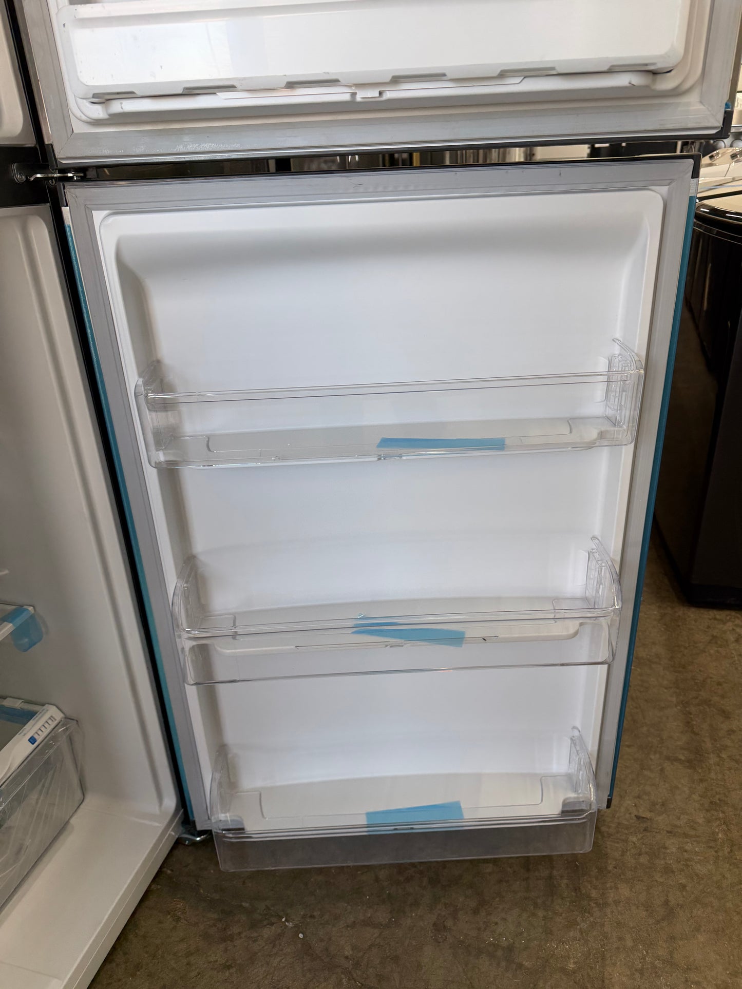 Frigidaire 30 in. 20 cu. ft. Garage Ready Top Freezer Refrigerator  Model: FFTR2045V