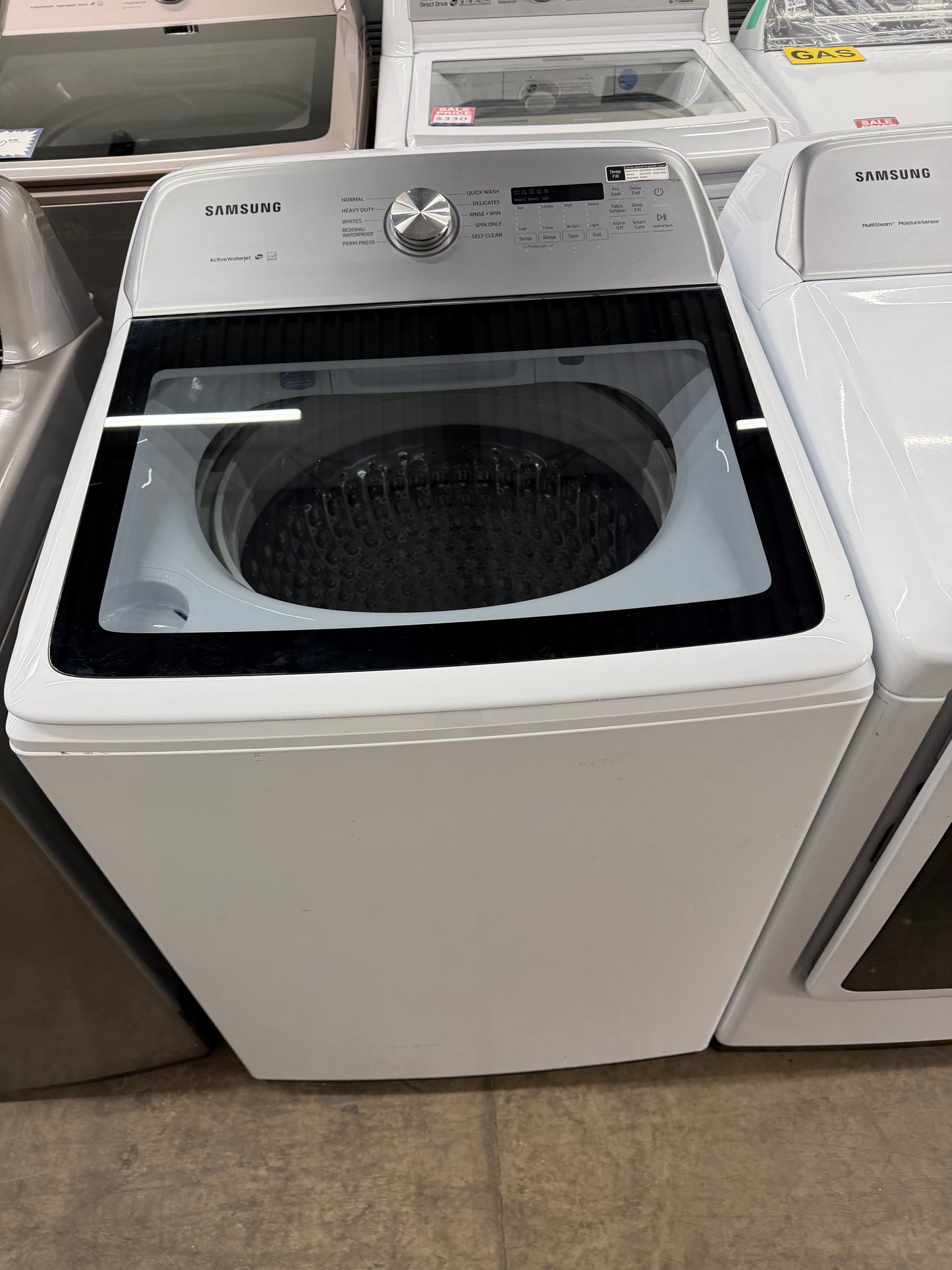 Samsung 5.4 cu. ft. Top Load Washer and 7.4 cu. ft. Electric Dryer