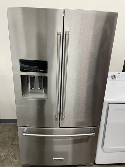 KitchenAid  KRFF507HPS
36 Inch Freestanding French Door Refrigerator with 26.8 cu. ft. Total Capacity, PrintShield Finish, ExtendFresh Temperature Management System, External Ice/Water Dispenser, Water Filtered, Star-K Certified, and ENERGY STAR : Stain