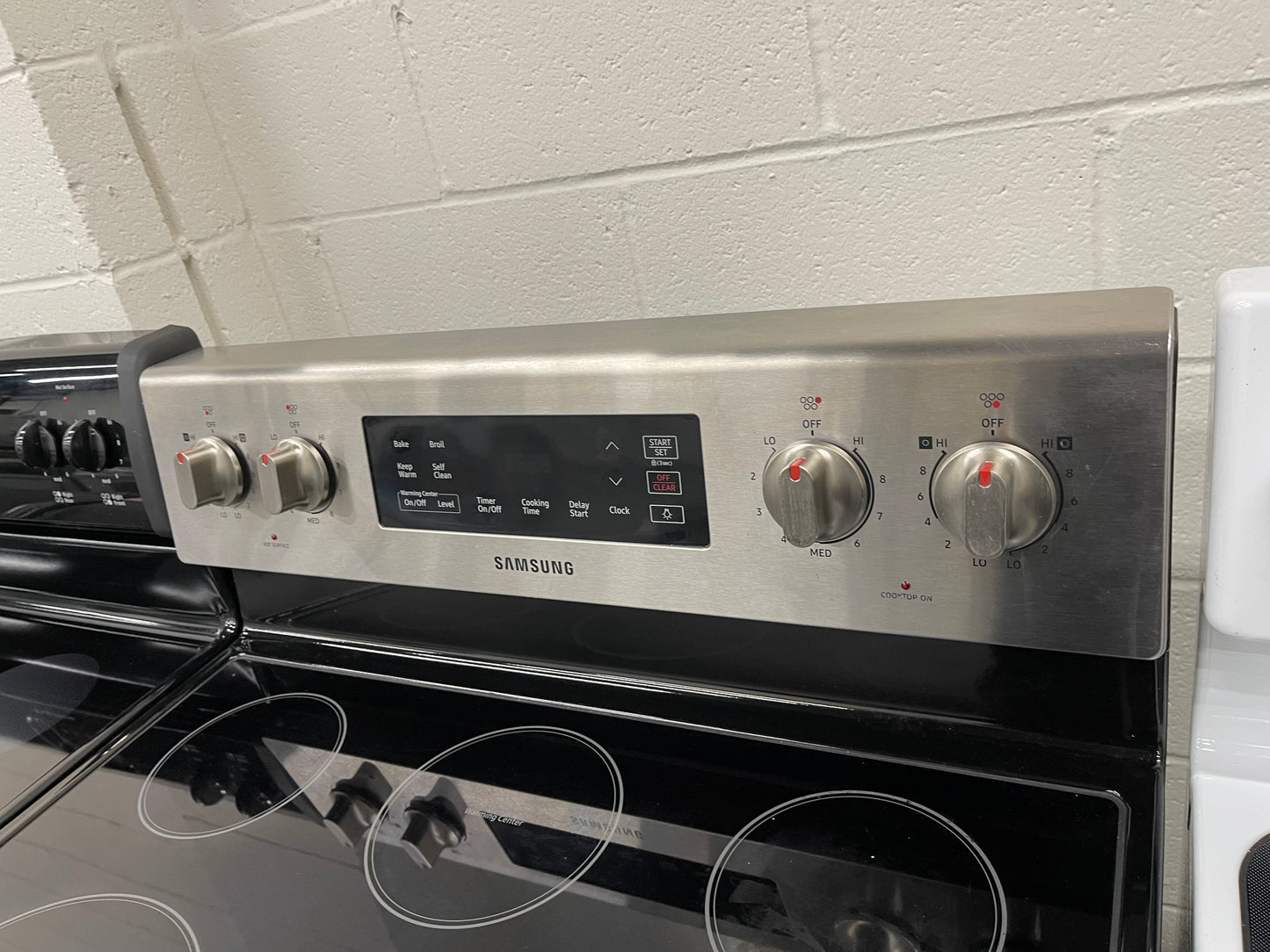 Samsung  NE59M4310SS
30 Inch Freestanding Electric Range with Flexible Cooktop, Dual Elements, Self-Clean, Warming Center, 5 Heating Elements, 5.9 cu. ft. Capacity, Storage Drawer and Sabbath Mode: Stainless Steel