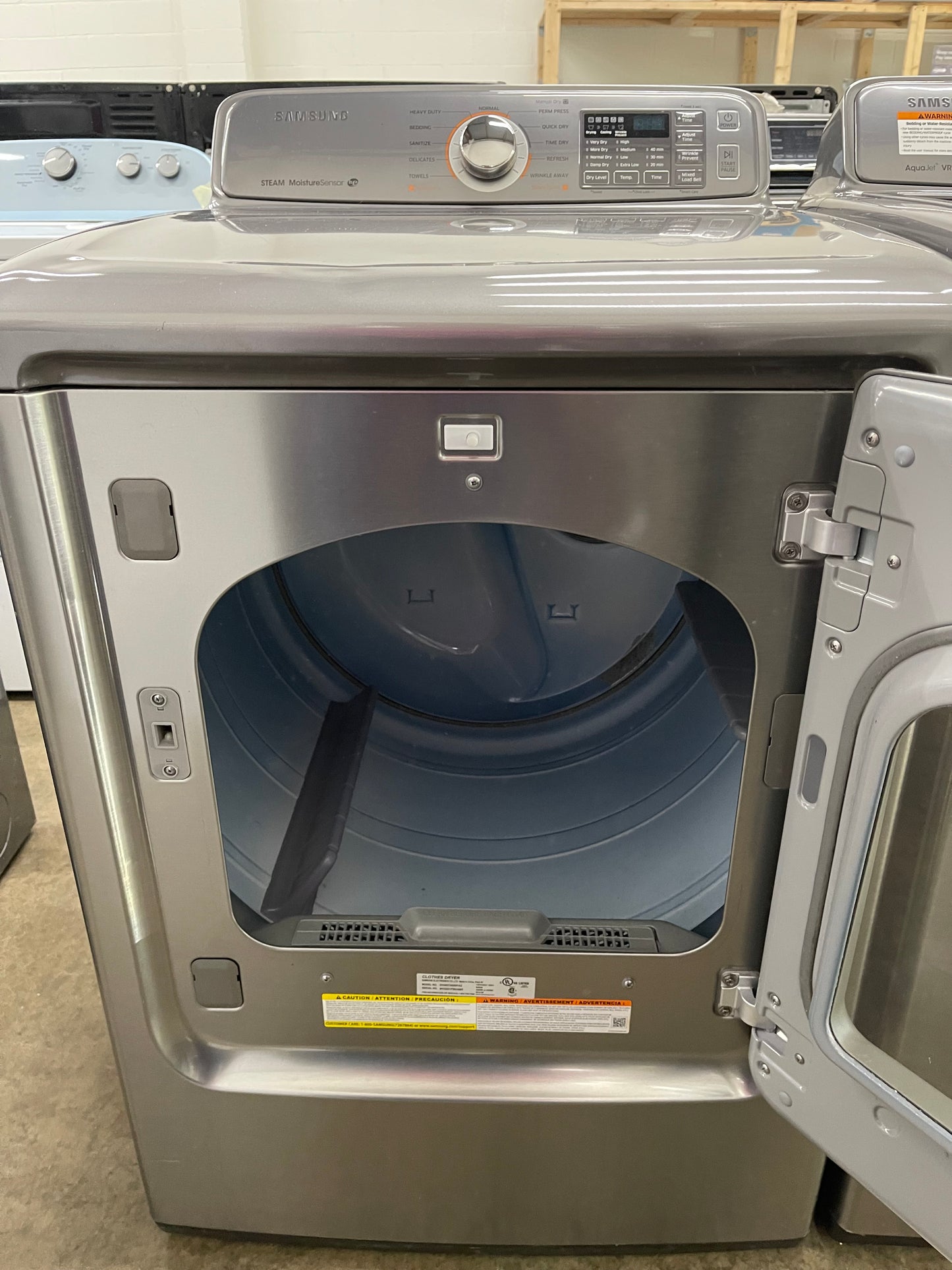 Samsung  WA48H7400AP
27 Inch 4.8 cu. ft. Top Load Washer with 11 Wash Cycles and Samsung  DV48H7400EP
27 Inch 7.4 cu. ft. Electric Dryer with 11 Dry Cycles,