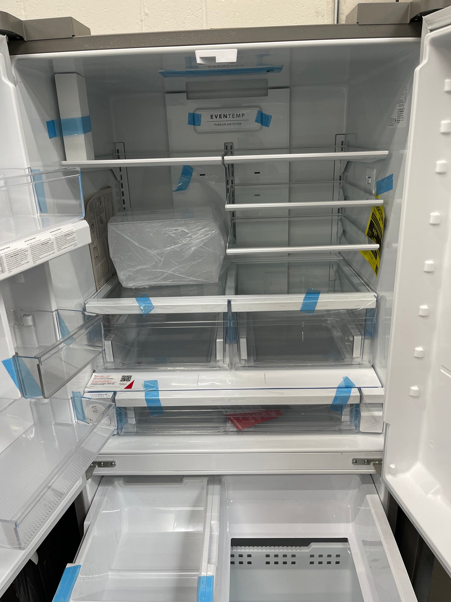 Frigidaire 28.8-cu ft 3-Door French Door Refrigerator With Ice Maker with Water Dispenser in Stainless Steel-Model #FRFN2813AF