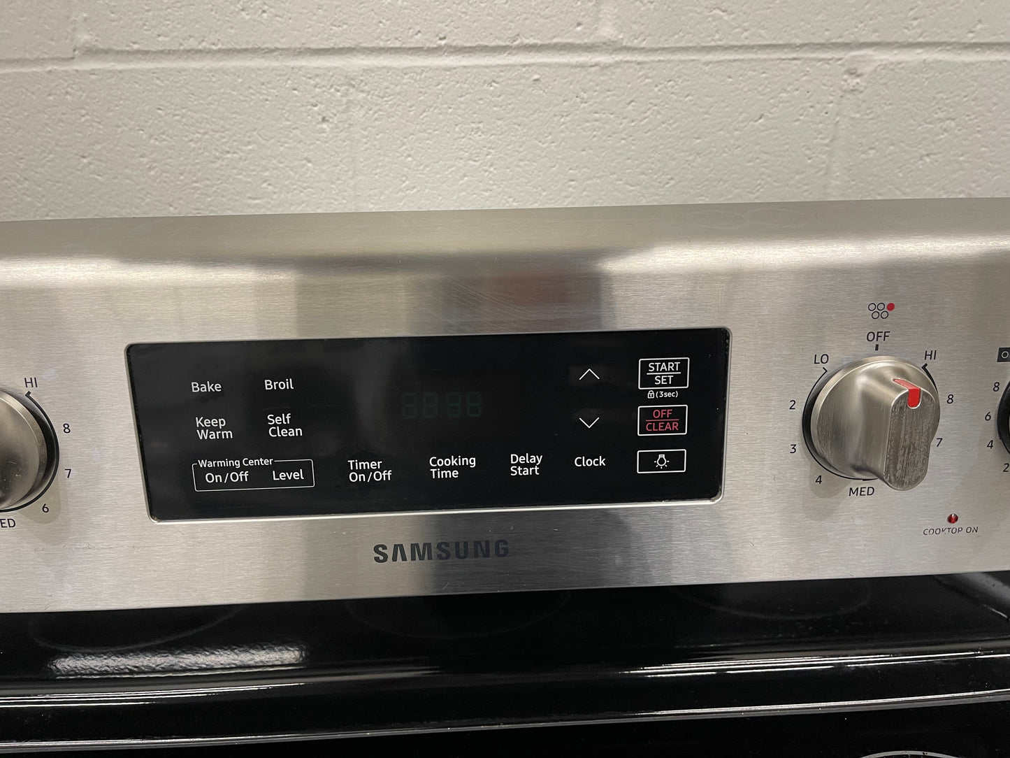 Samsung  NE59M4310SS
30 Inch Freestanding Electric Range with Flexible Cooktop, Dual Elements, Self-Clean, Warming Center, 5 Heating Elements, 5.9 cu. ft. Capacity, Storage Drawer and Sabbath Mode: Stainless Steel