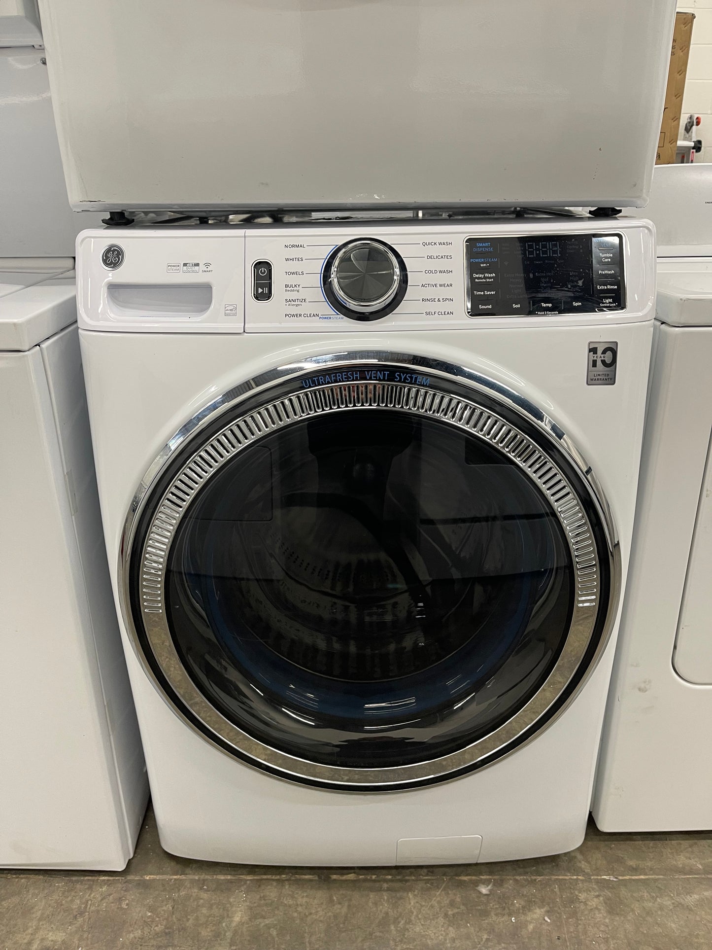 GE GFW650SSNWW Front Load Washer & GFD65ESSNWW Electric Dryer