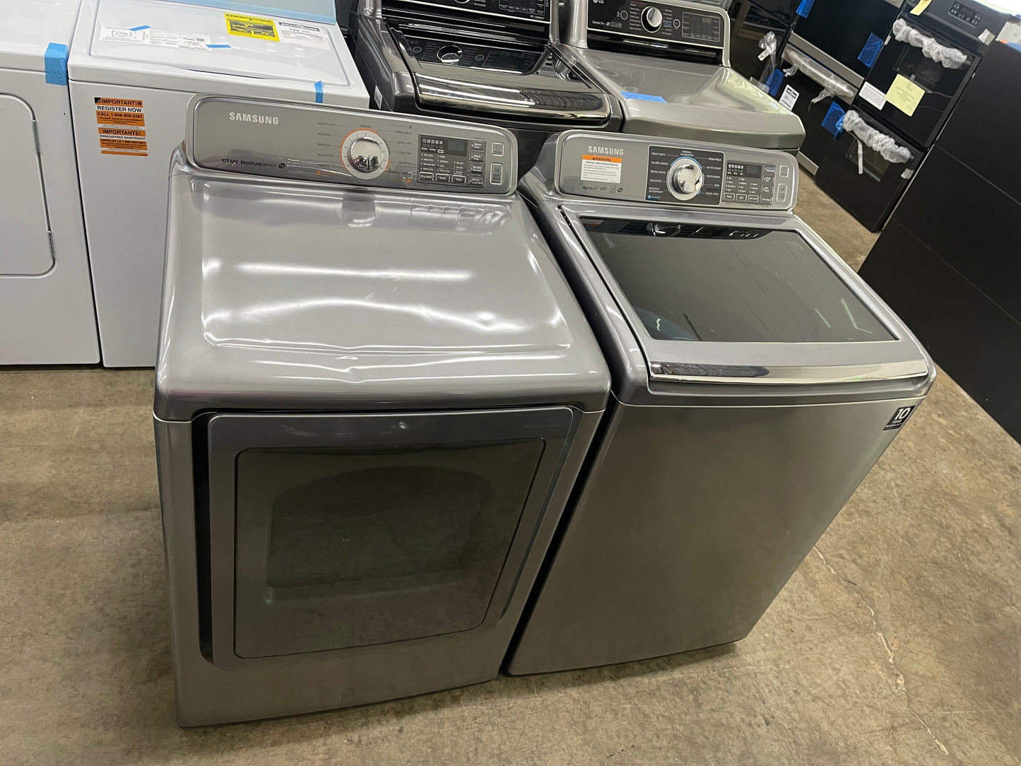 Samsung  WA48H7400AP
27 Inch 4.8 cu. ft. Top Load Washer with 11 Wash Cycles and Samsung  DV48H7400EP
27 Inch 7.4 cu. ft. Electric Dryer with 11 Dry Cycles,