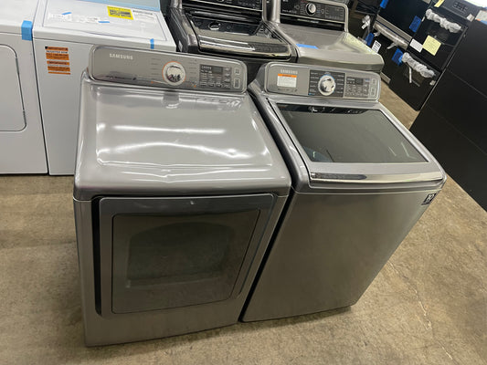 Samsung  WA48H7400AP
27 Inch 4.8 cu. ft. Top Load Washer with 11 Wash Cycles and Samsung  DV48H7400EP
27 Inch 7.4 cu. ft. Electric Dryer with 11 Dry Cycles,