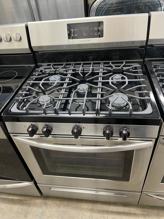 Frigidaire 30-in 5 Burners 5-cu ft Self Cleaning Gas Range in Stainless Steel-Model #FFGF3054TS