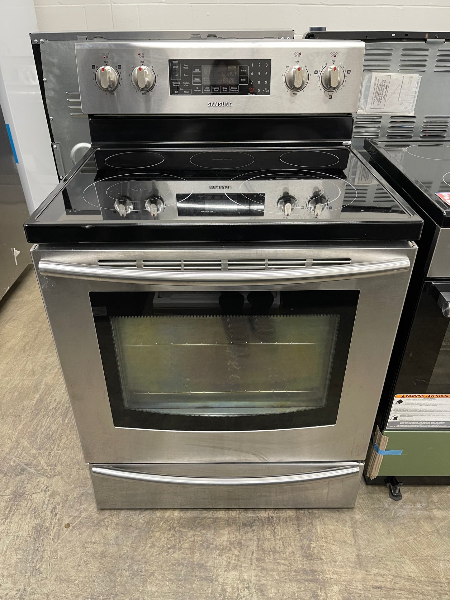 Samsung  FTQ387LWGX
30 Inch Freestanding Electric Range with 5 Cooktop Elements, 5.9 cu. ft. Convention Oven, Steam and Self Clean, Warming Drawer and Sabbath Mode