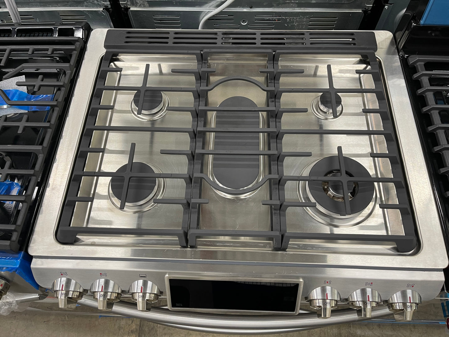 Samsung  NX58H9500WS
30 Inch Slide-In Gas Range with 5.8 cu. ft. True Convection Oven, Reversible Griddle, Self-Clean, Temperature Probe, Guiding Light Controls, 5 Sealed Burners, 18,000 BTU Center Burner, and Warming Drawer: Stainless Steel