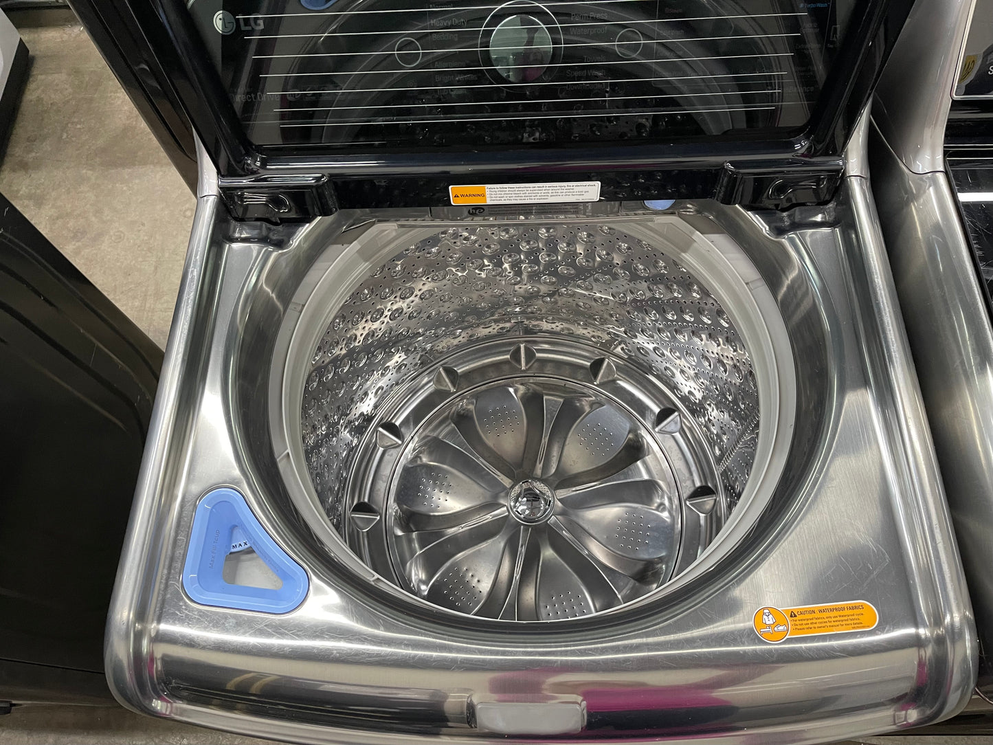 LG TurboWash Series  WT7700HVA
29 Inch 5.7 cu. ft. Top Load Washer with 14 Wash Cycles and LG SteamDryer Series  DLEX7700VE
29 Inch 9.0 cu. ft. Electric Dryer with 14 Drying Cycles