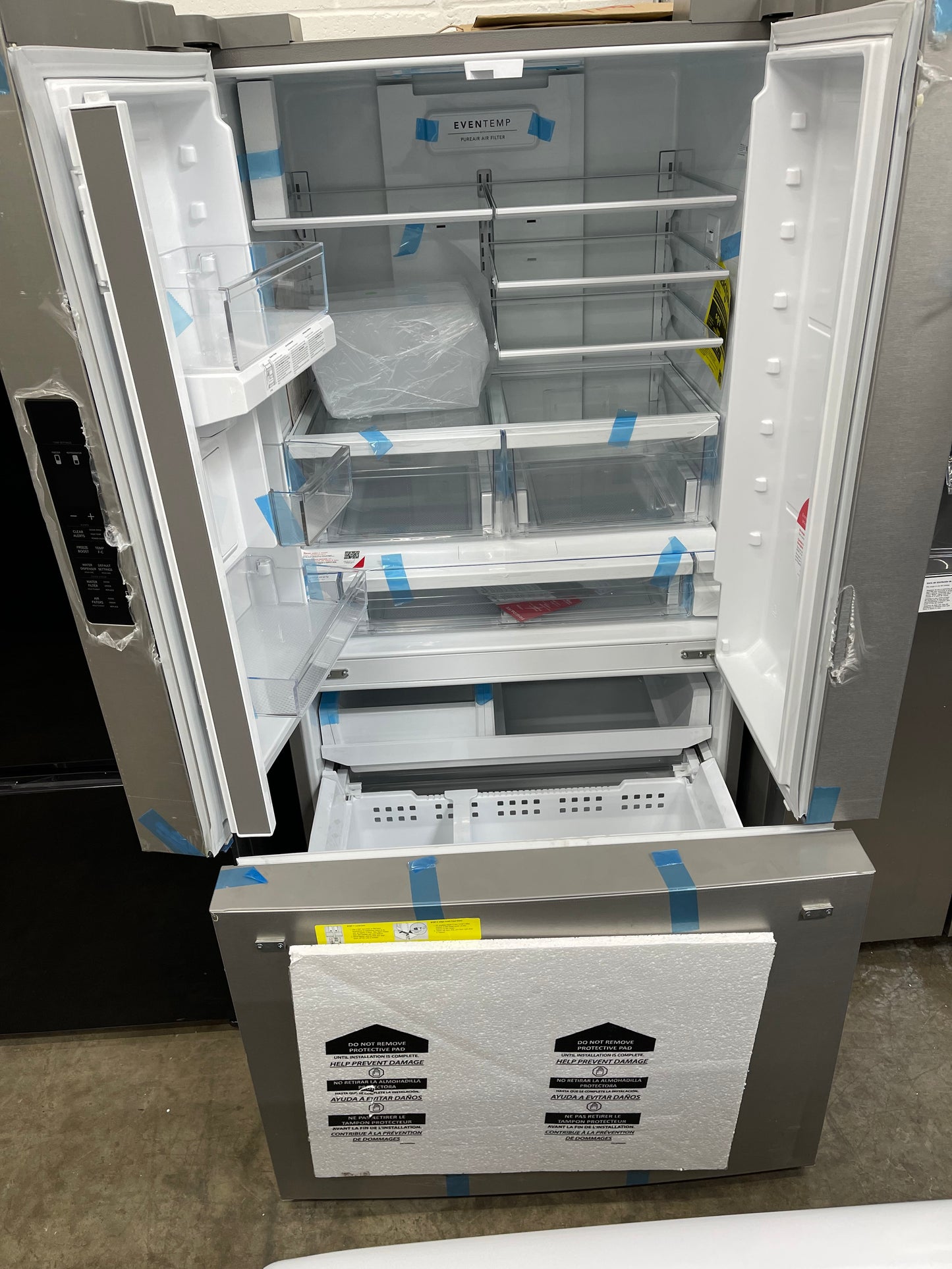 Frigidaire 28.8-cu ft 3-Door French Door Refrigerator With Ice Maker with Water Dispenser in Stainless Steel-Model #FRFN2813AF