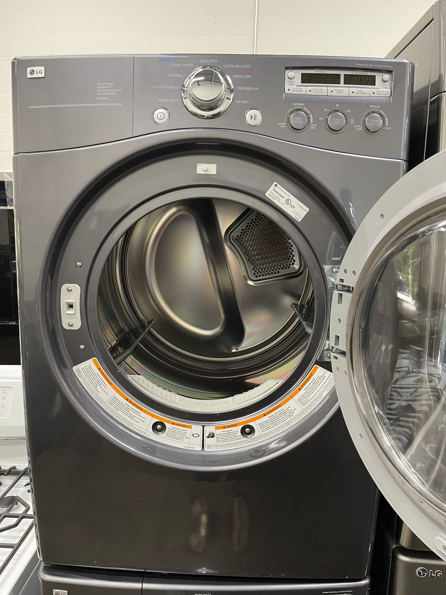 LG  WM2455HG
27 Inch Front-Load Washer with 4.2 cu. ft. Capacity and LG  DLE5955G
27 Inch Electric Dryer with 7.3 cu. ft. Capacity