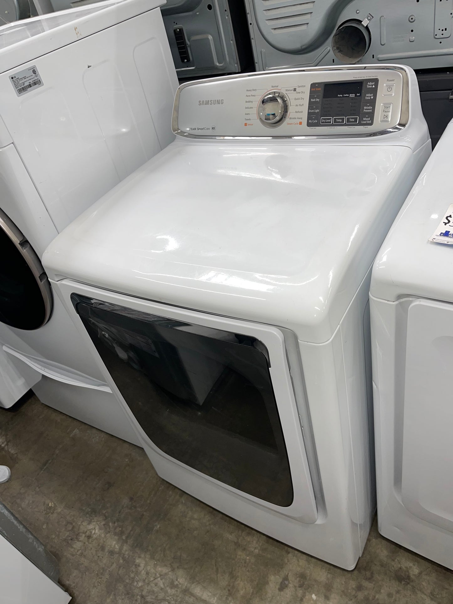 Samsung  DV50F9A6EVW
27 Inch Electric Dryer with 7.4 cu. ft. Capacity, 13 Drying Cycles, Dryer Rack, Smart Care, LED Controls, Stainless Steel Drum, Reversible Door, Wrinkle Away and Steam