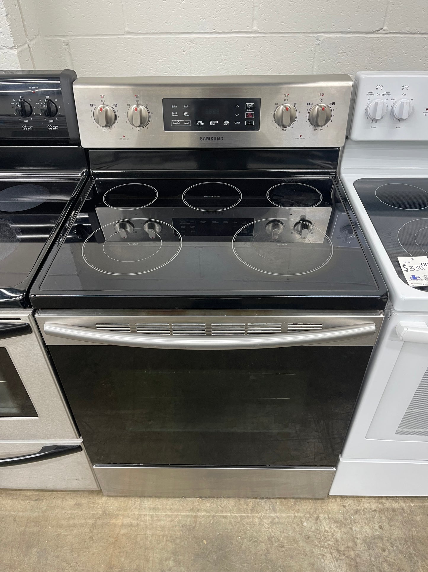 Samsung  NE59M4310SS
30 Inch Freestanding Electric Range with Flexible Cooktop, Dual Elements, Self-Clean, Warming Center, 5 Heating Elements, 5.9 cu. ft. Capacity, Storage Drawer and Sabbath Mode: Stainless Steel