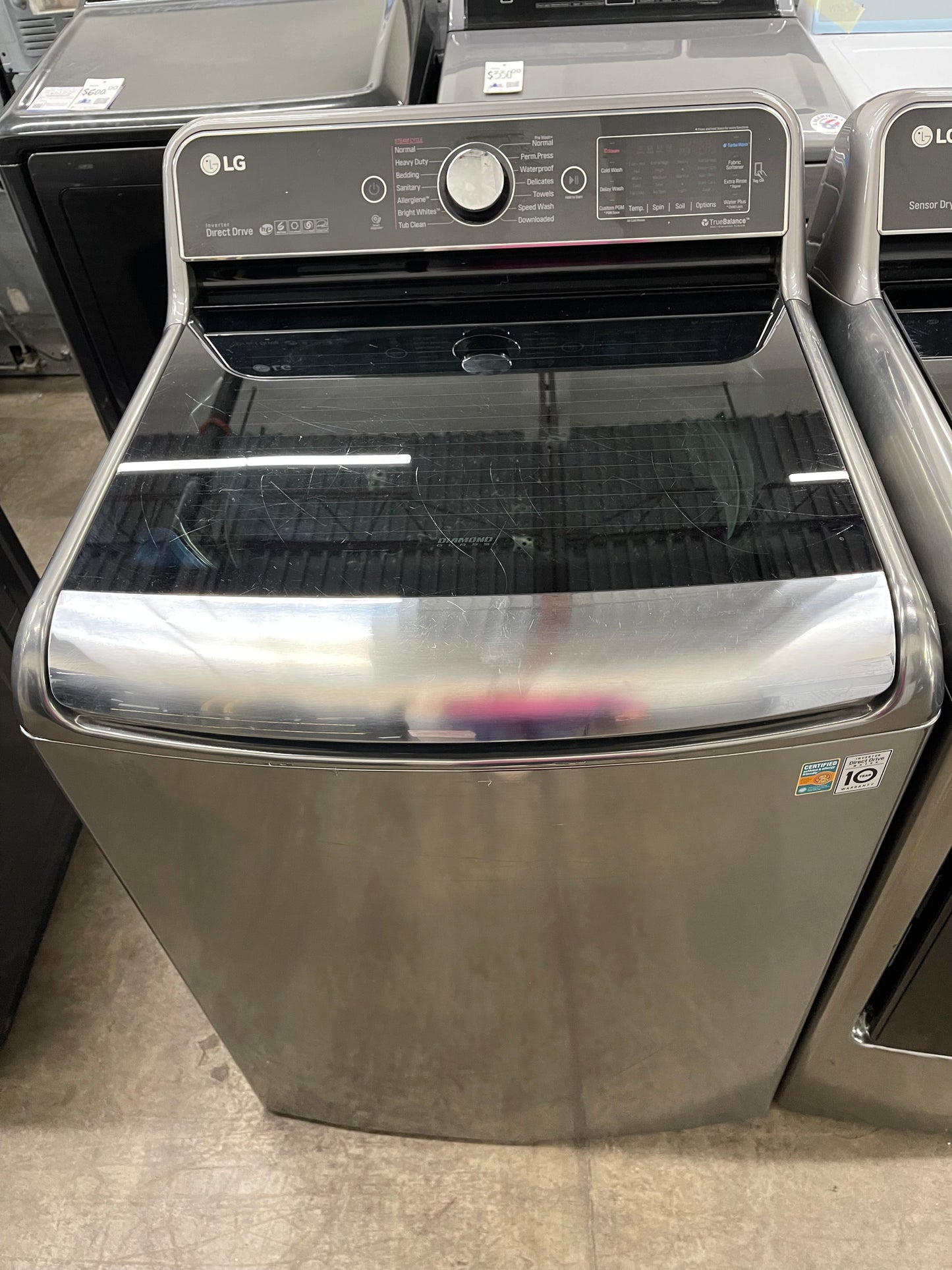 LG TurboWash Series  WT7700HVA
29 Inch 5.7 cu. ft. Top Load Washer with 14 Wash Cycles and LG SteamDryer Series  DLEX7700VE
29 Inch 9.0 cu. ft. Electric Dryer with 14 Drying Cycles