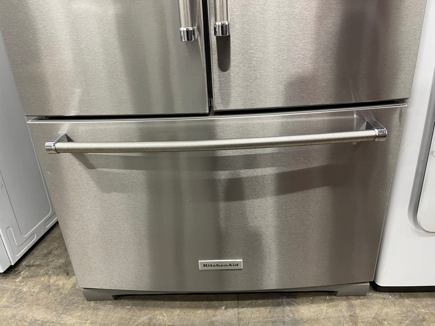 KitchenAid  KRFF507HPS
36 Inch Freestanding French Door Refrigerator with 26.8 cu. ft. Total Capacity, PrintShield Finish, ExtendFresh Temperature Management System, External Ice/Water Dispenser, Water Filtered, Star-K Certified, and ENERGY STAR : Stain